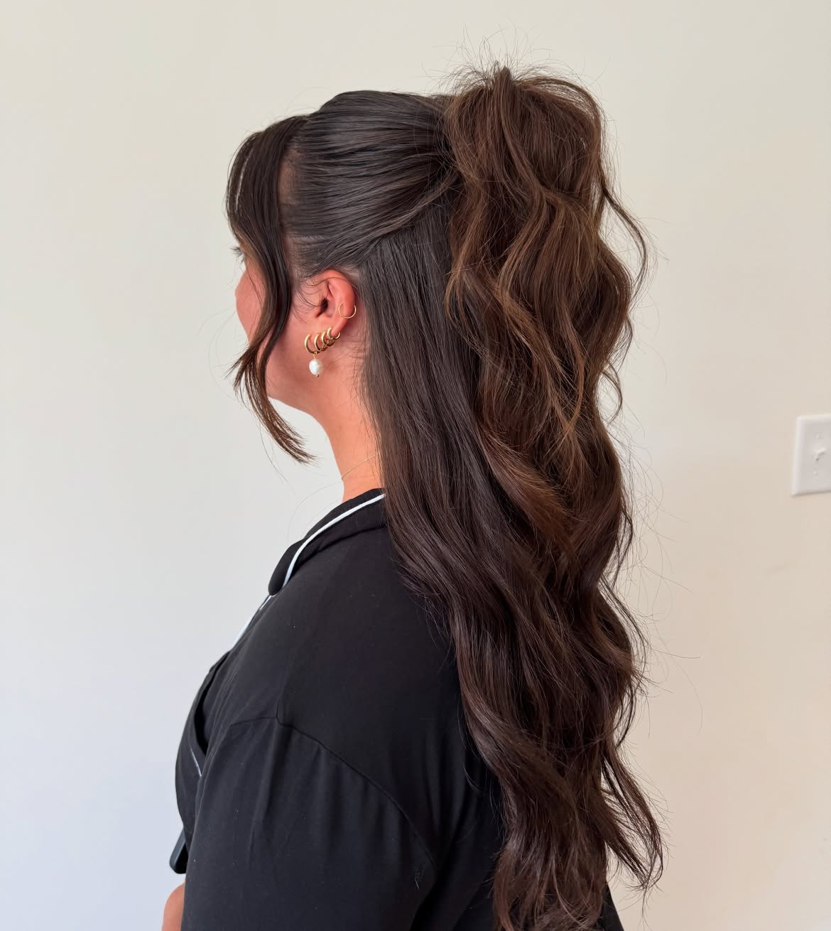 High Pouf Ponytail With Voluminous Waves