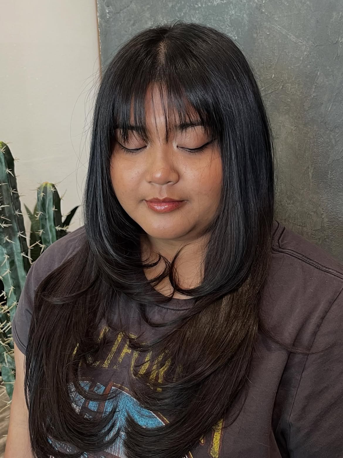 Layered Black Lob With Wispy Bangs And Face Framing