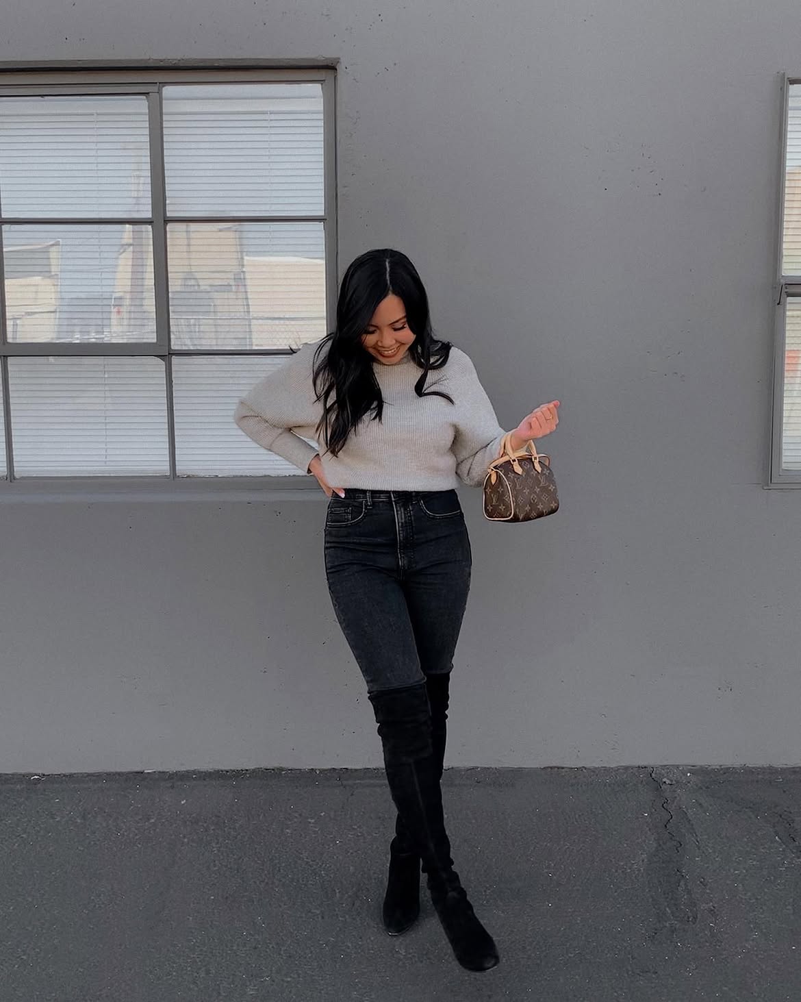 Light Grey Sweater With Black Skinny Jeans and Boots
