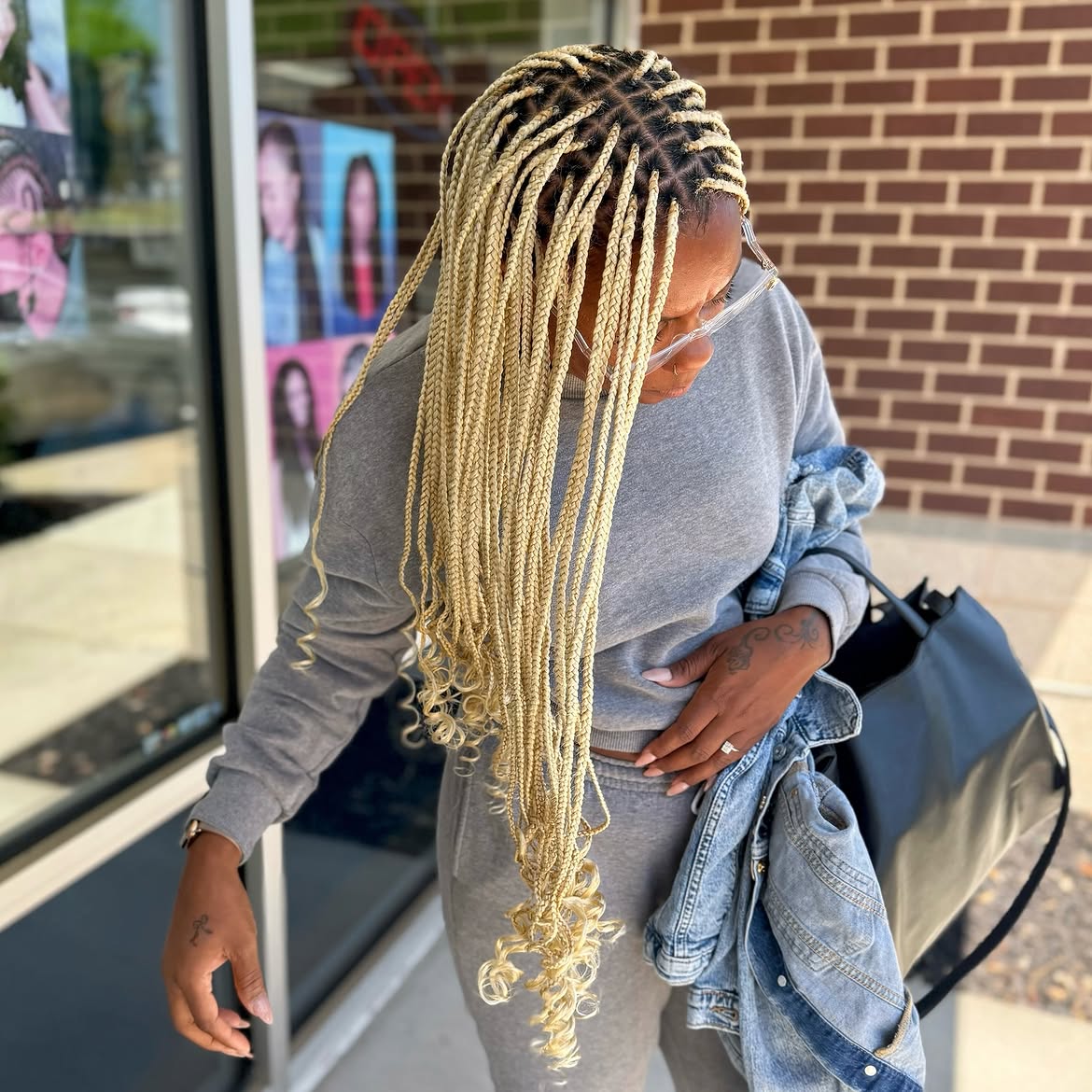 Long Blonde Box Braids With Curly Ends