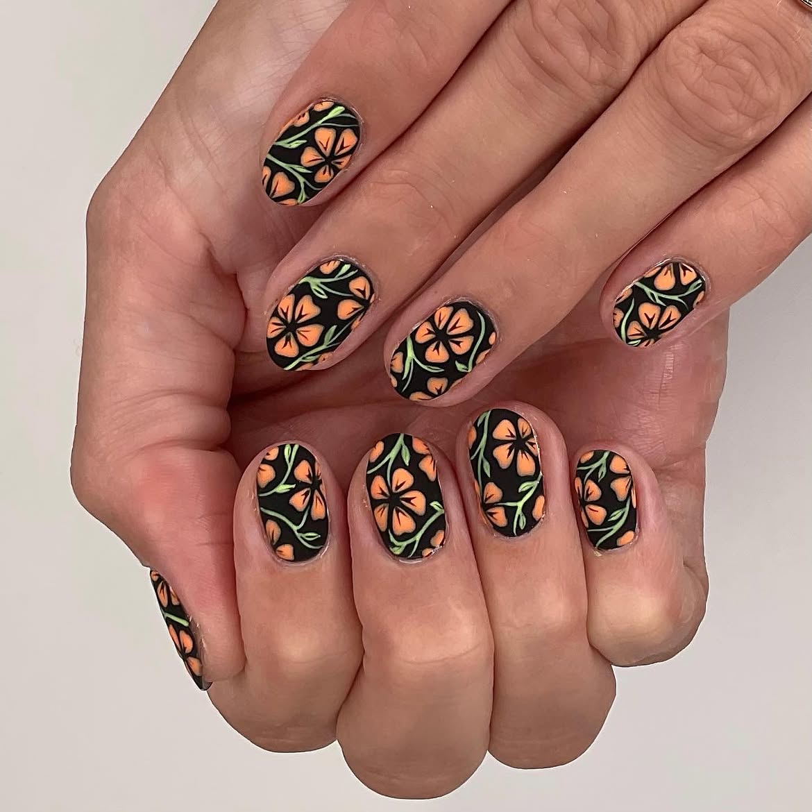 Matte Black Orange Floral Oval Nails