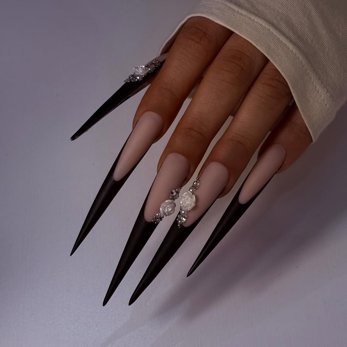 Matte Black Stiletto French Tip Nails with Roses