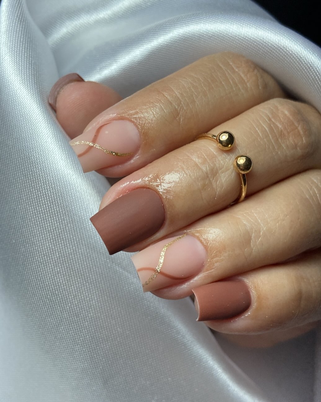 Matte Brown & Nude Swirl Gold Accent Nails