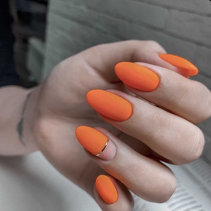 Matte Orange Oval Nails With Silver French Accent