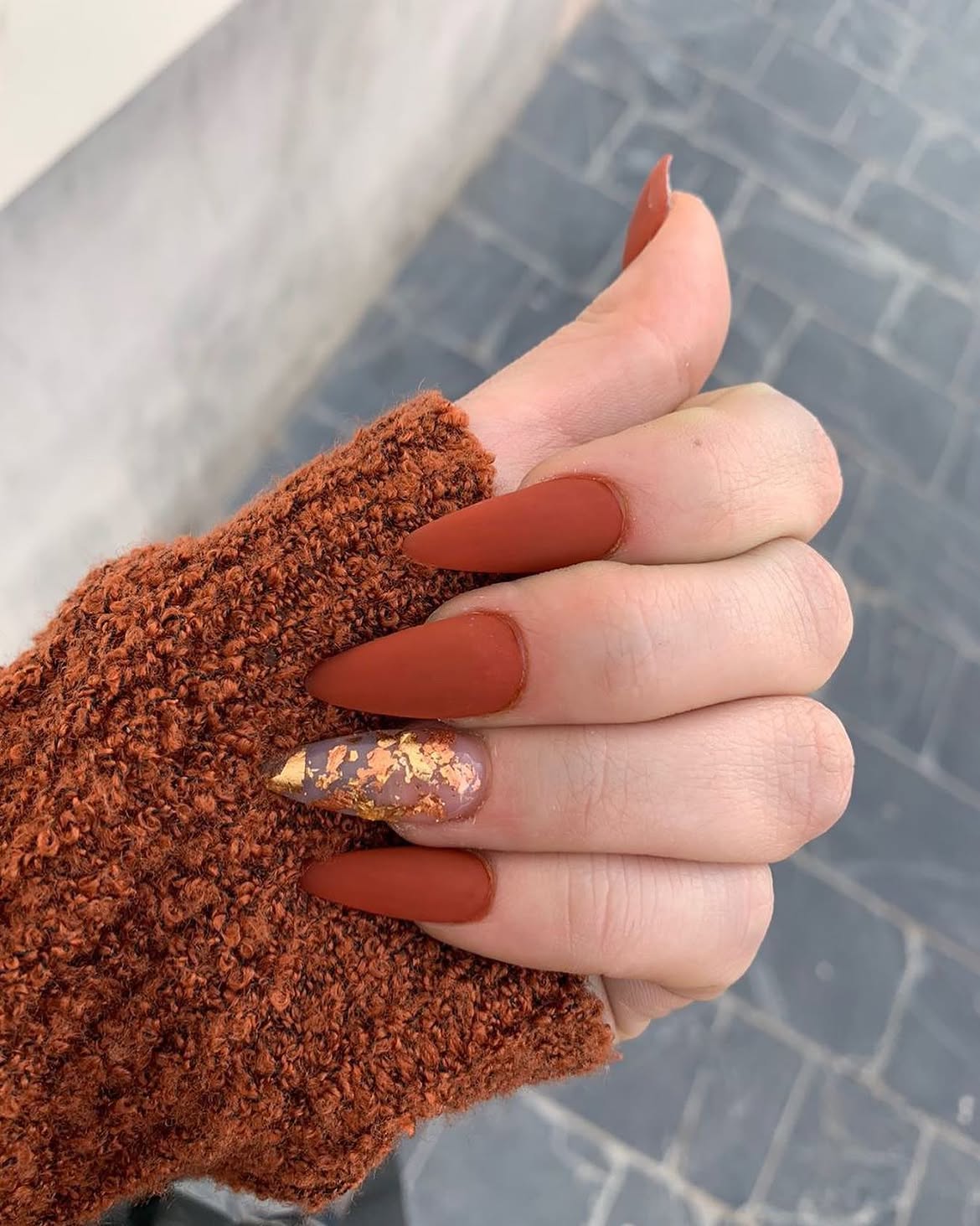 Matte Terracotta Stiletto Nails With Gold Foil Accent