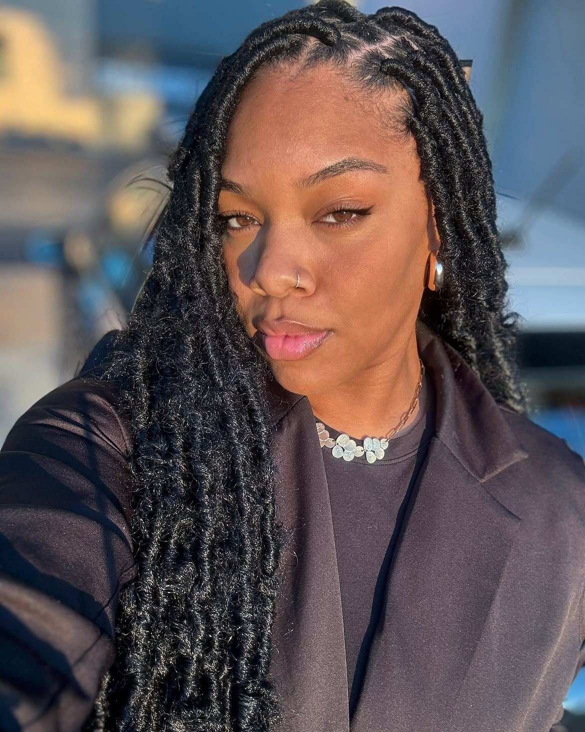 Messy Butterfly Locs With Defined Curls