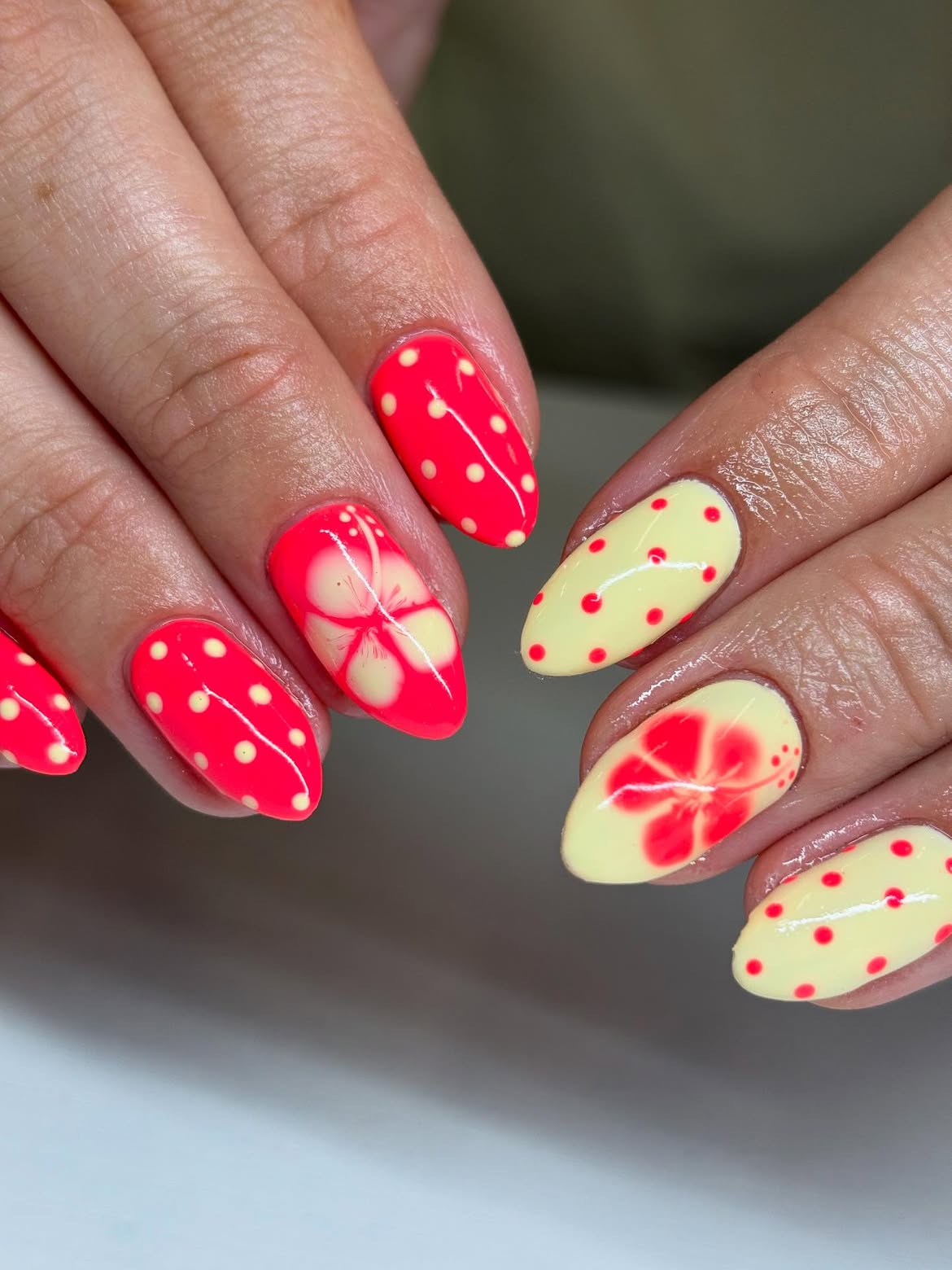 Neon Hibiscus And Polka Dot Almond Nails