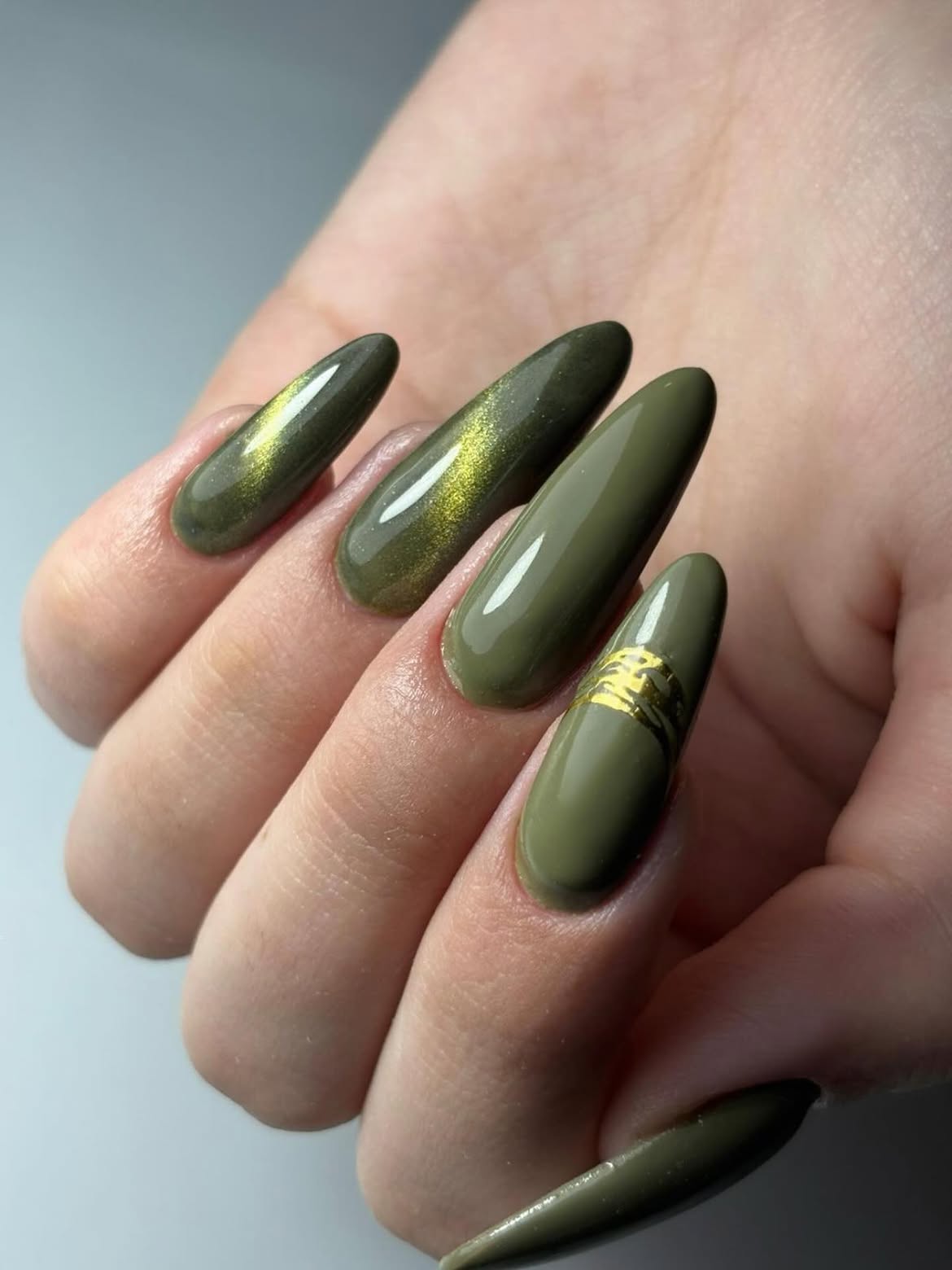 Olive Green Cat Eye Accented Almond Nails
