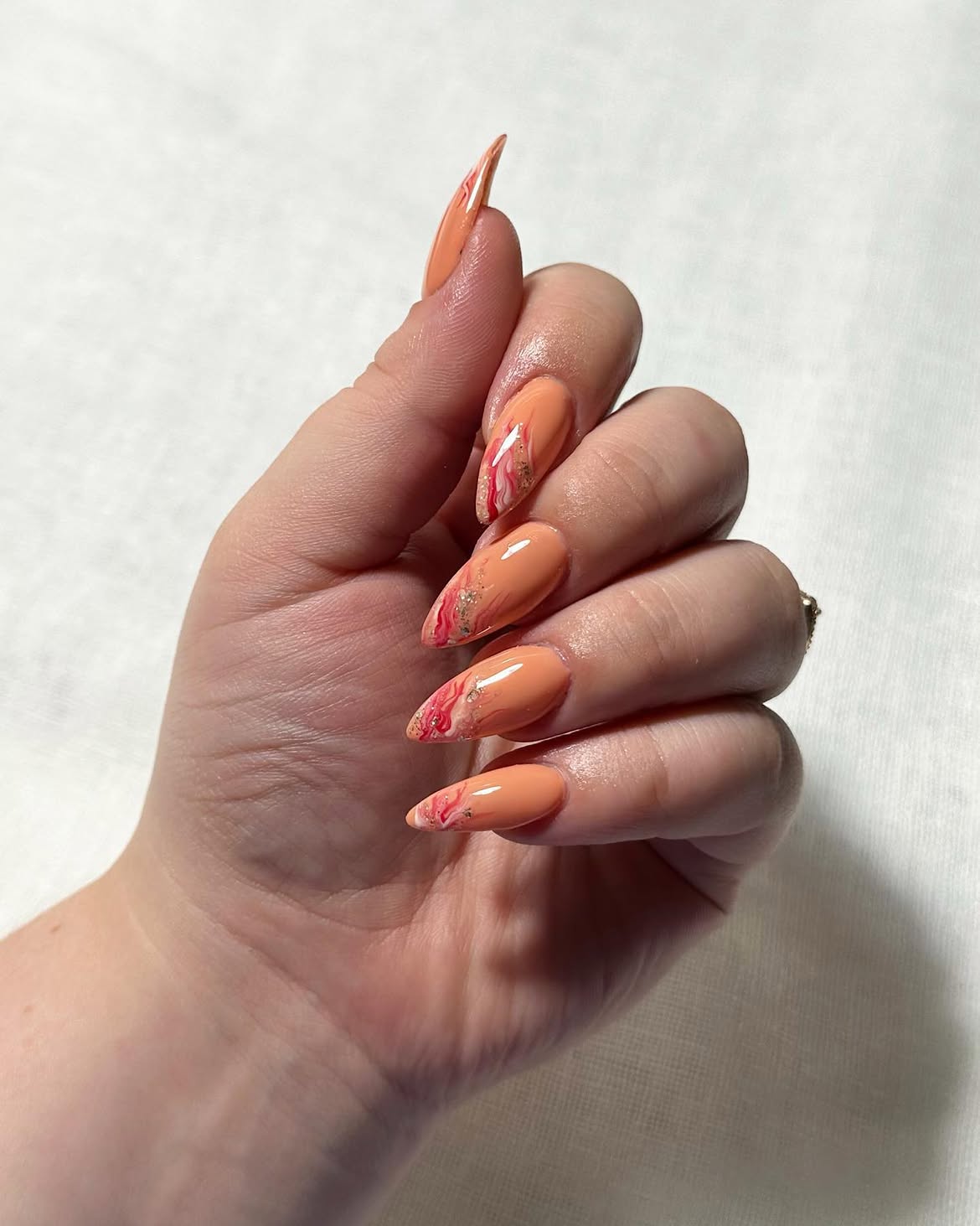 Orange Marble Swirl Almond Nails
