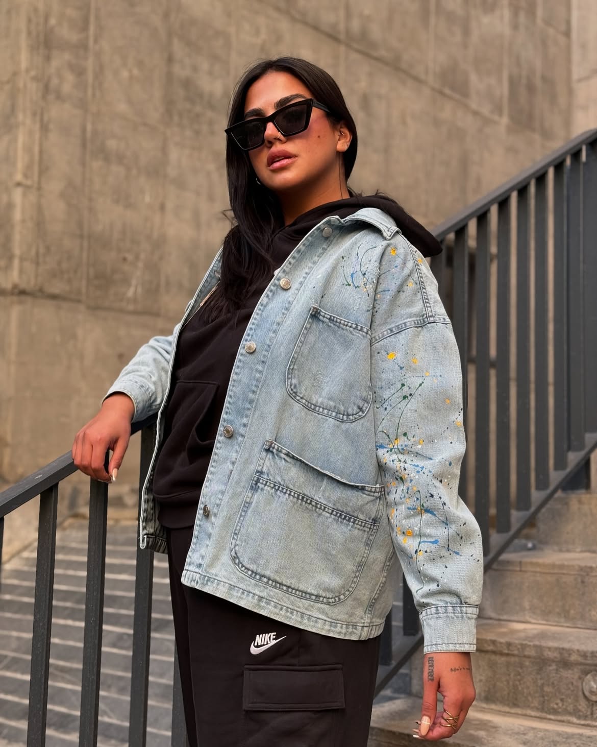 Paint Splatter Denim Jacket With Black Hoodie And Cargo Pants