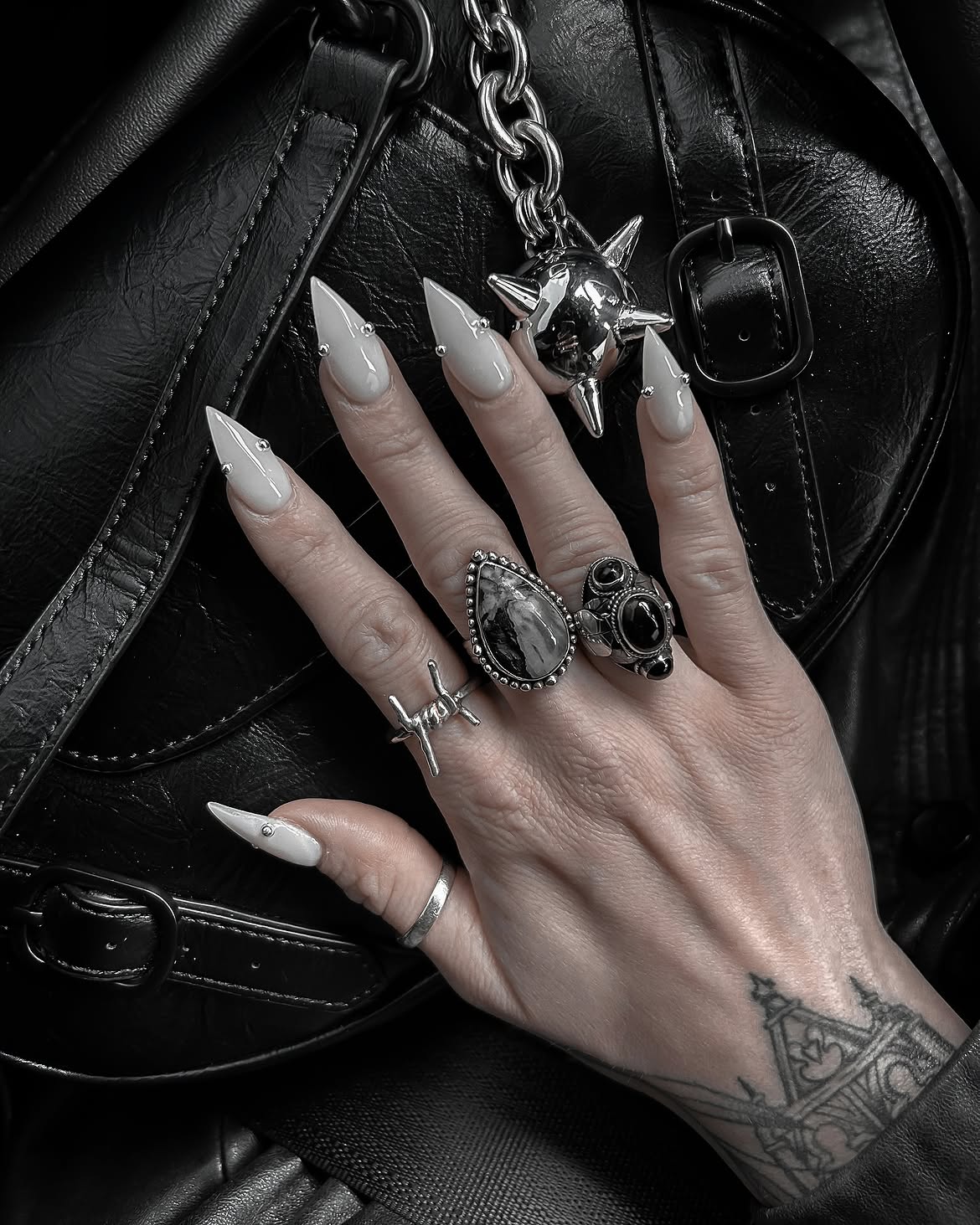 Pale Grey Stiletto Nails With Silver Stud Accents