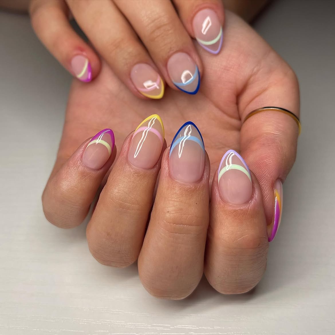 Pastel Outline French Tip Almond Nails