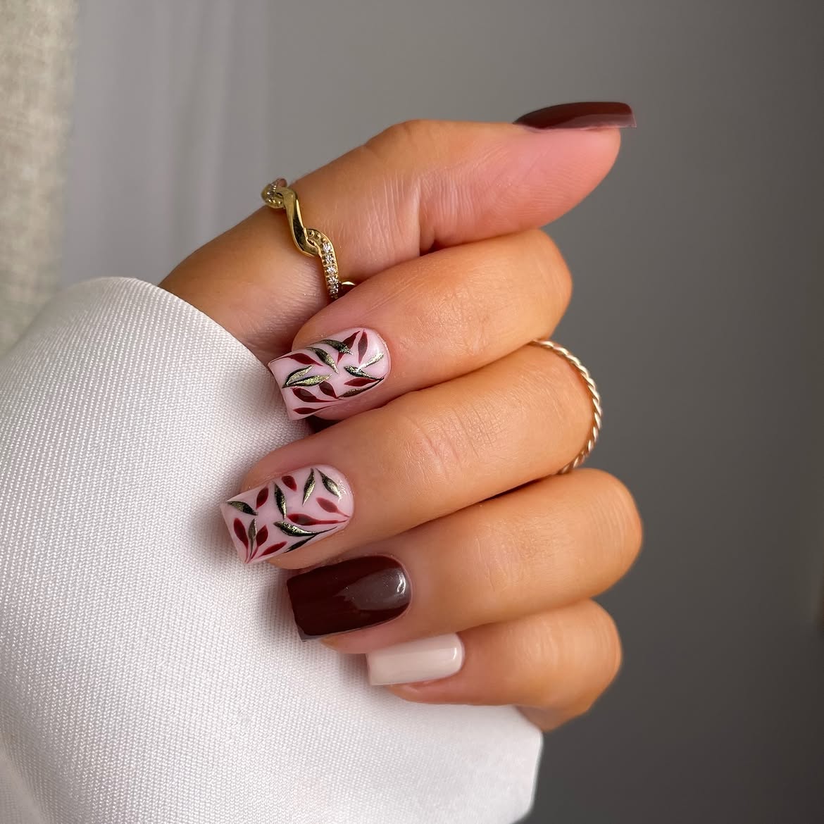 Pink Leafy Fall French Tip Manicure