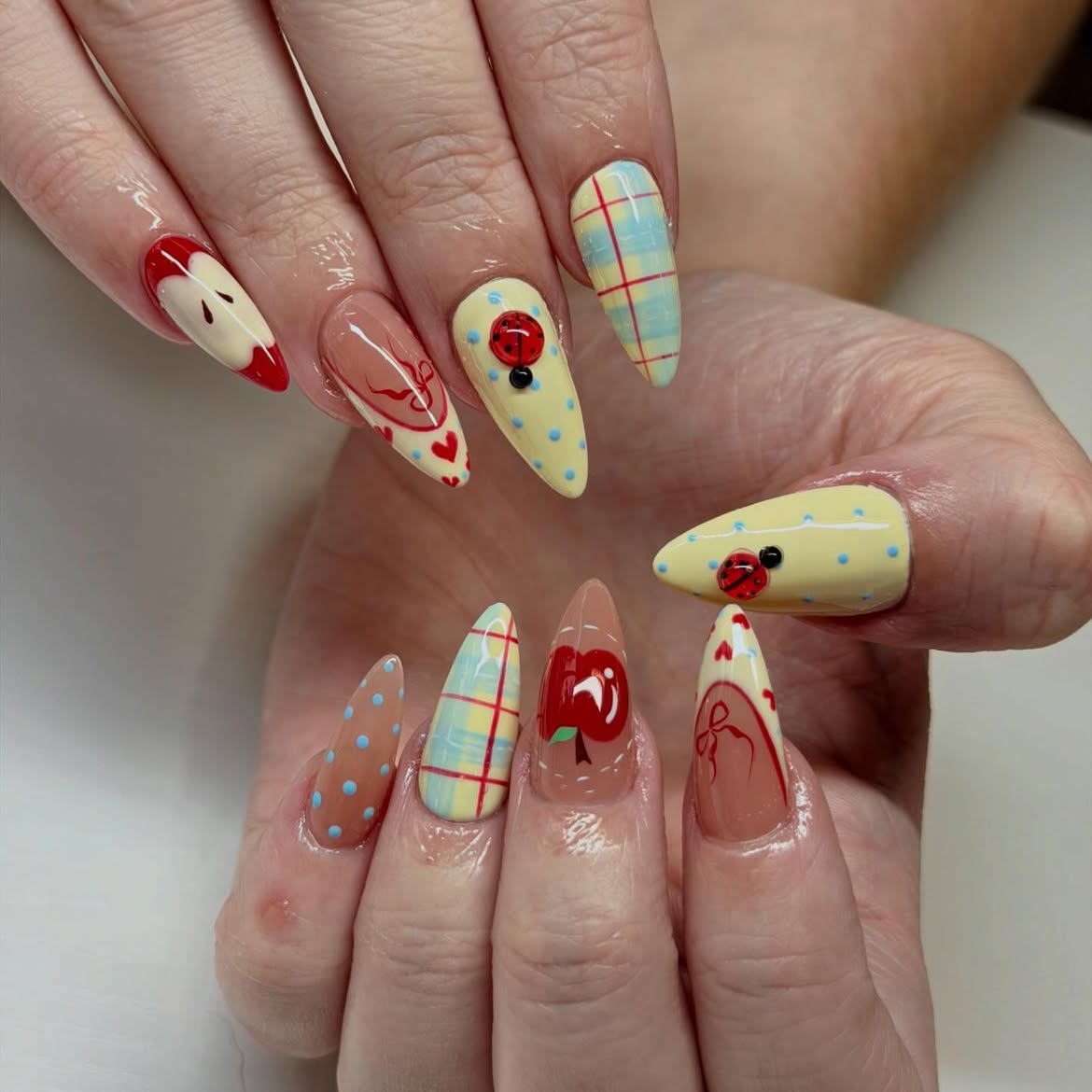 Playful Back-to-School Apple and Ladybug Nails