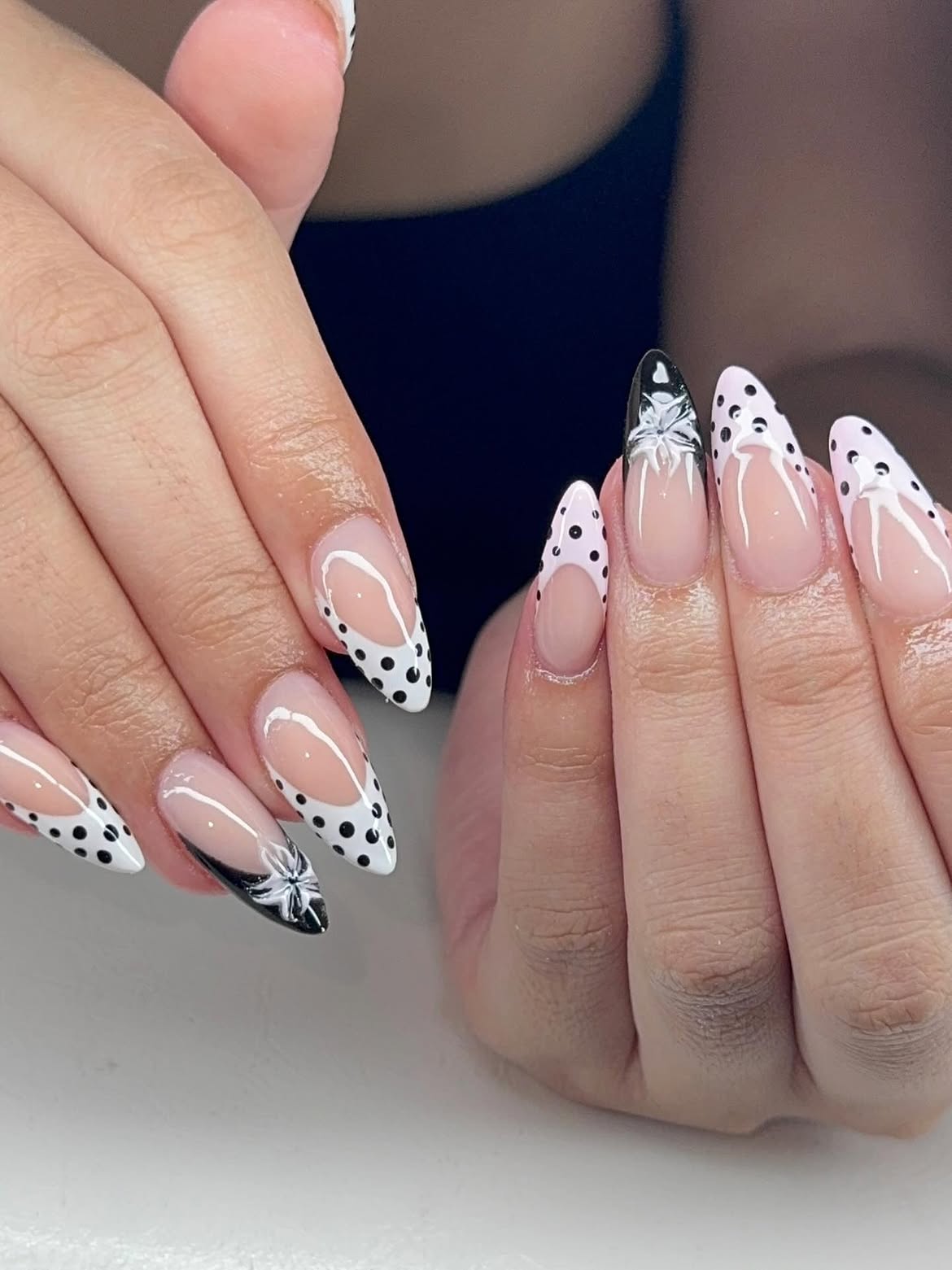Polka Dot French Tip Almond Nails with Flower Accent
