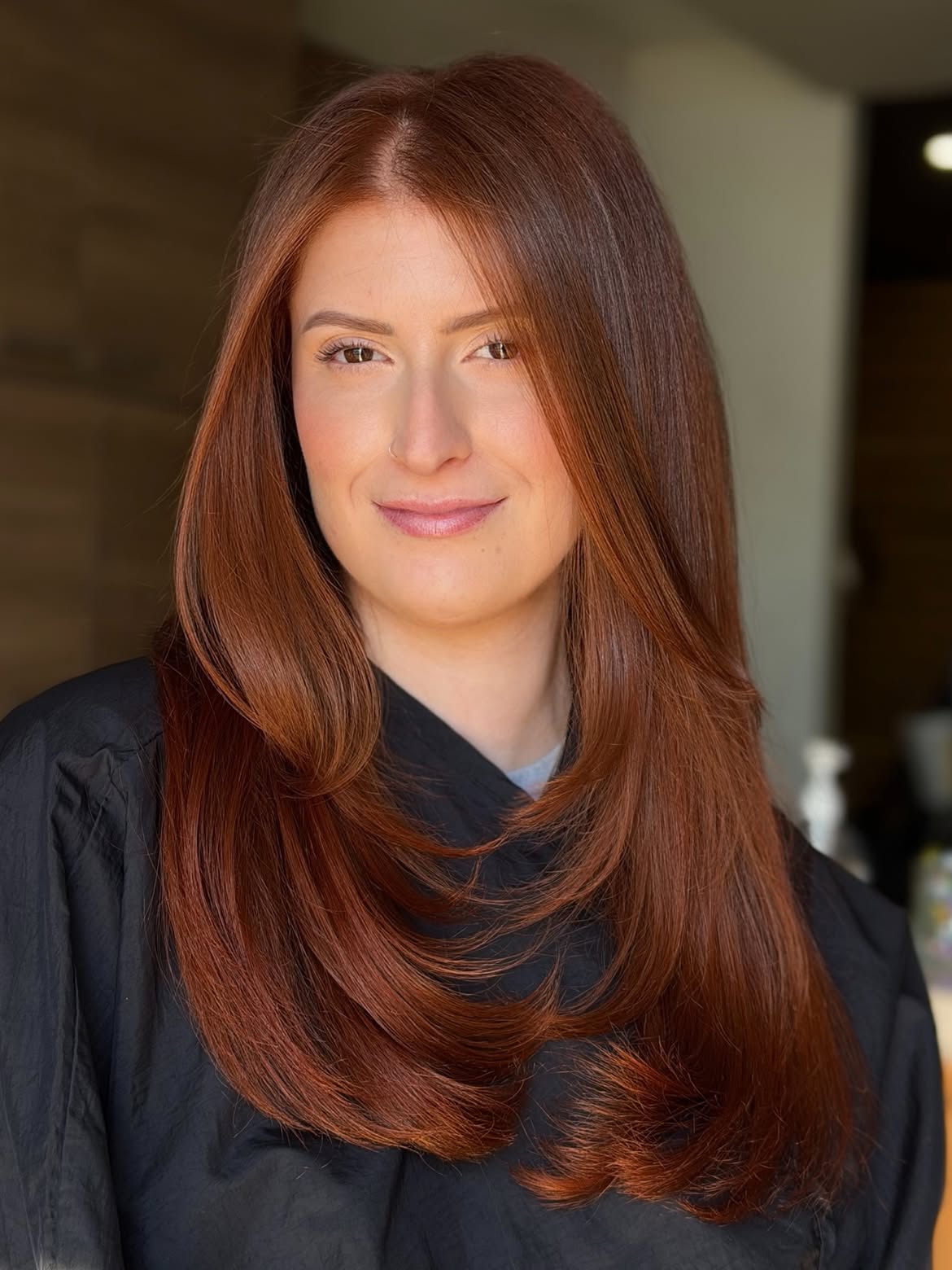 Rich Auburn Balayage With Face-Framing Layers