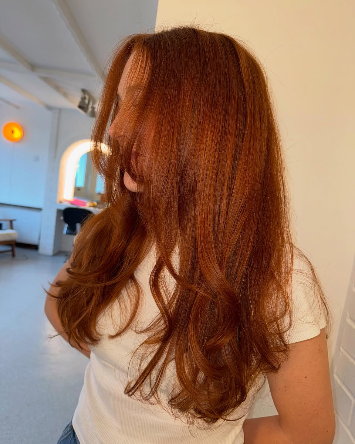 Rich Copper Balayage With Loose Modern Waves