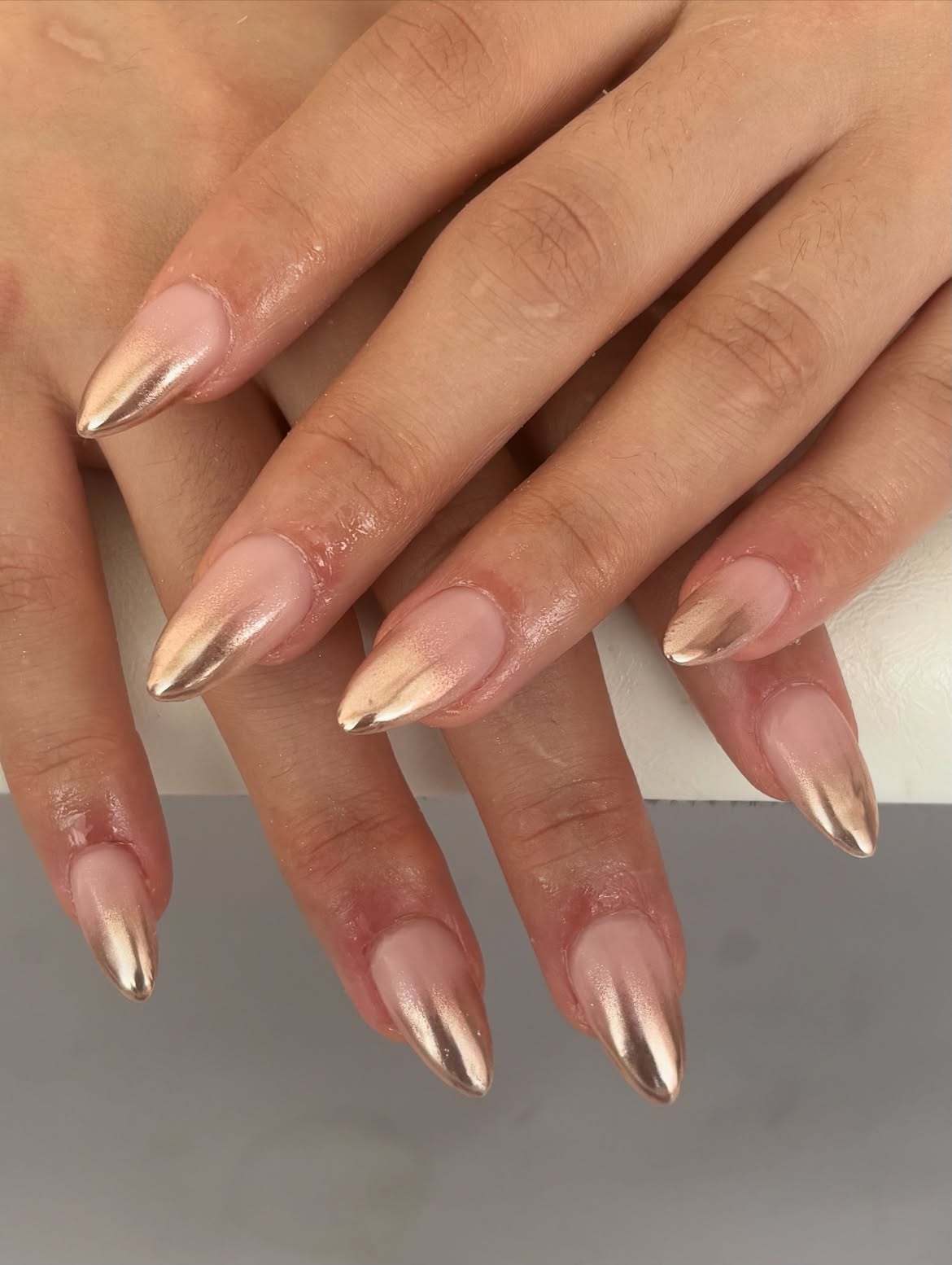 Rose Gold Chrome Almond Nails