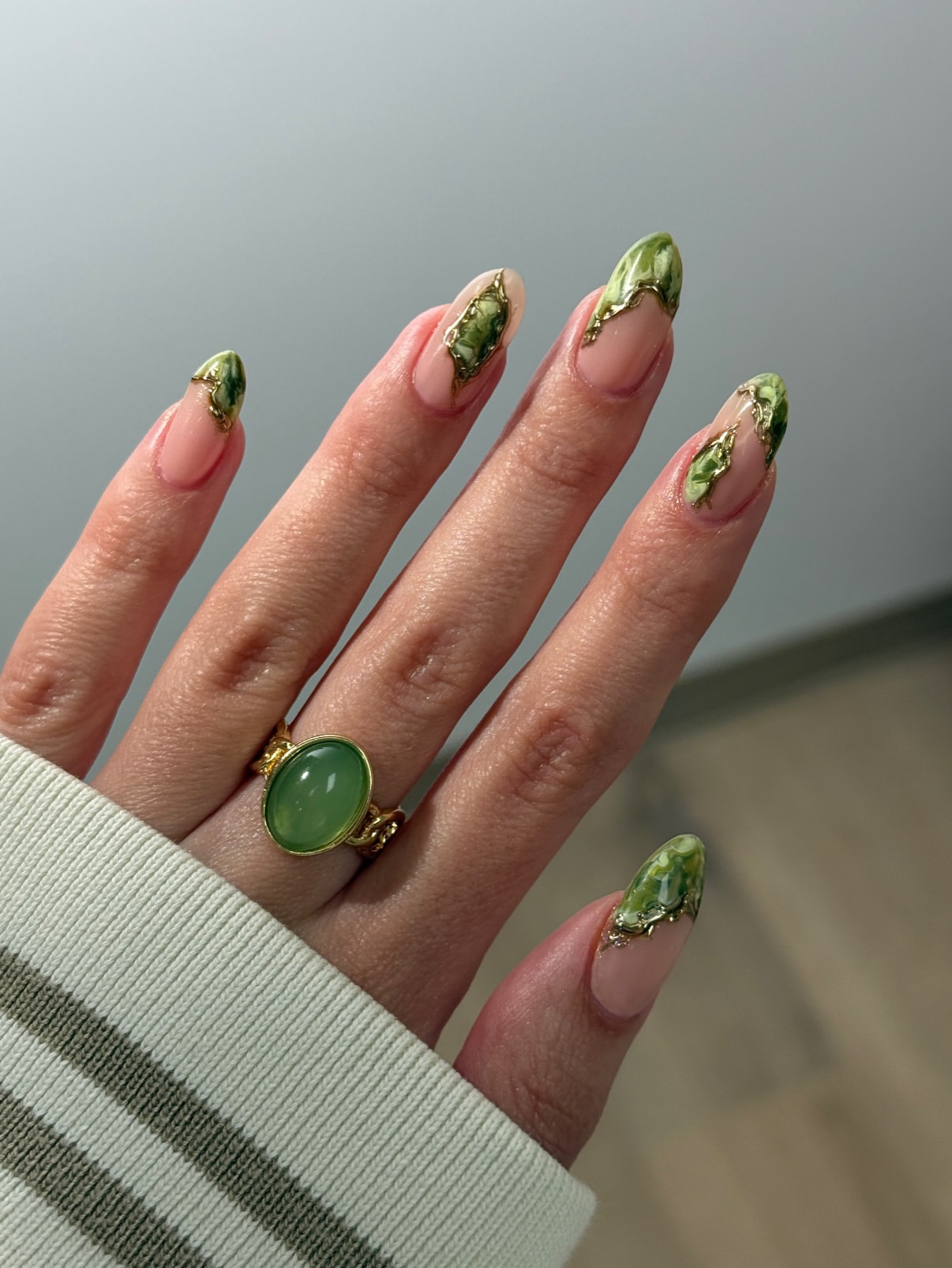 Sage Green Marble Almond Nails with Gold Accents