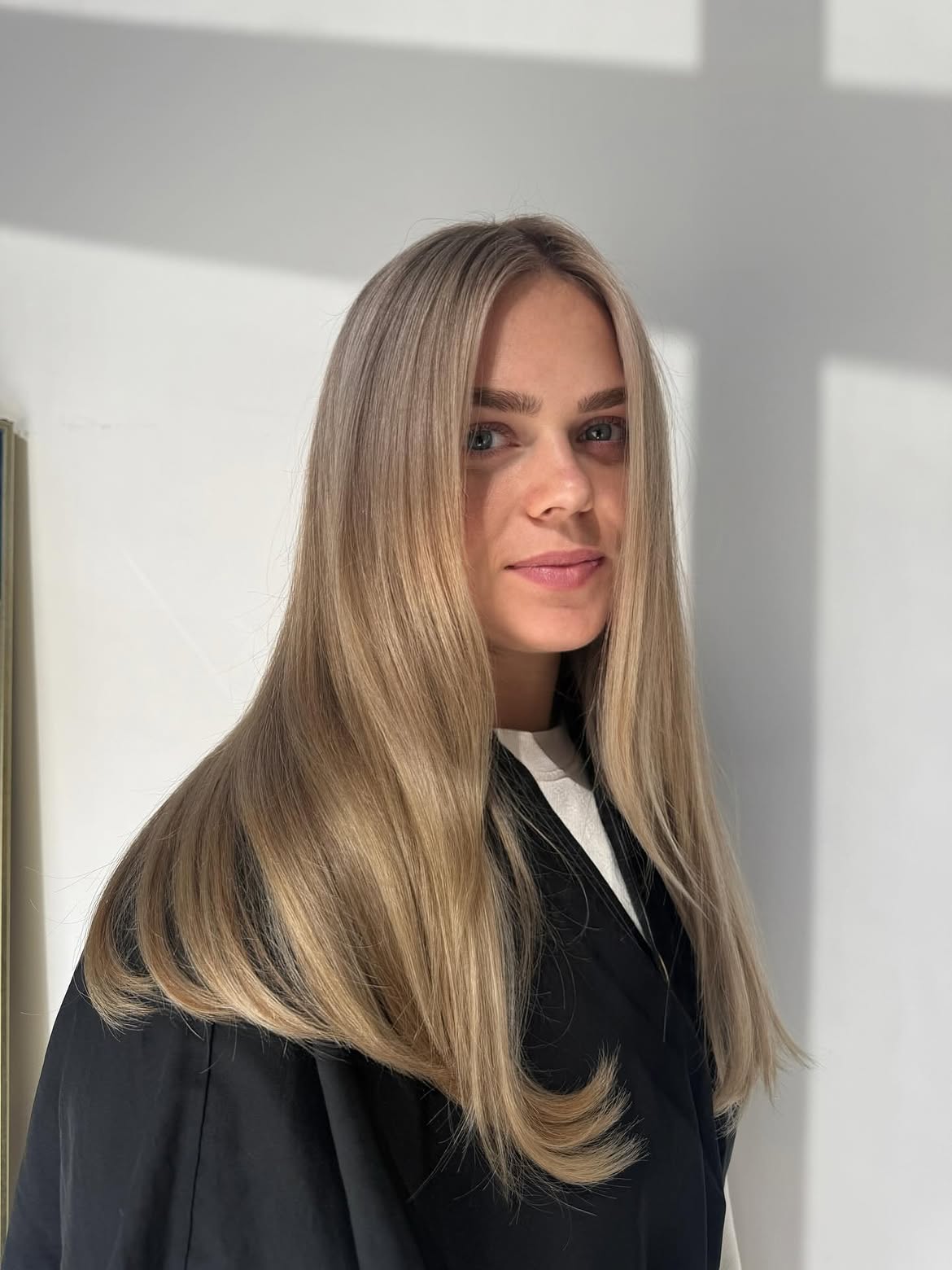 Sandy Blonde Balayage With Soft Face-Framing Layers