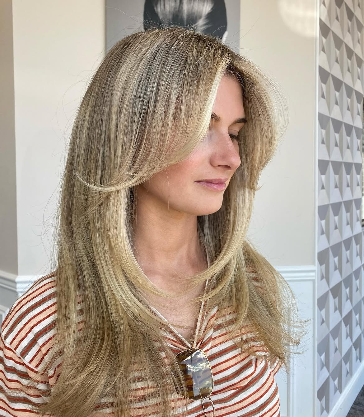 Soft Face-Framing Layers With Honey Blonde Highlights