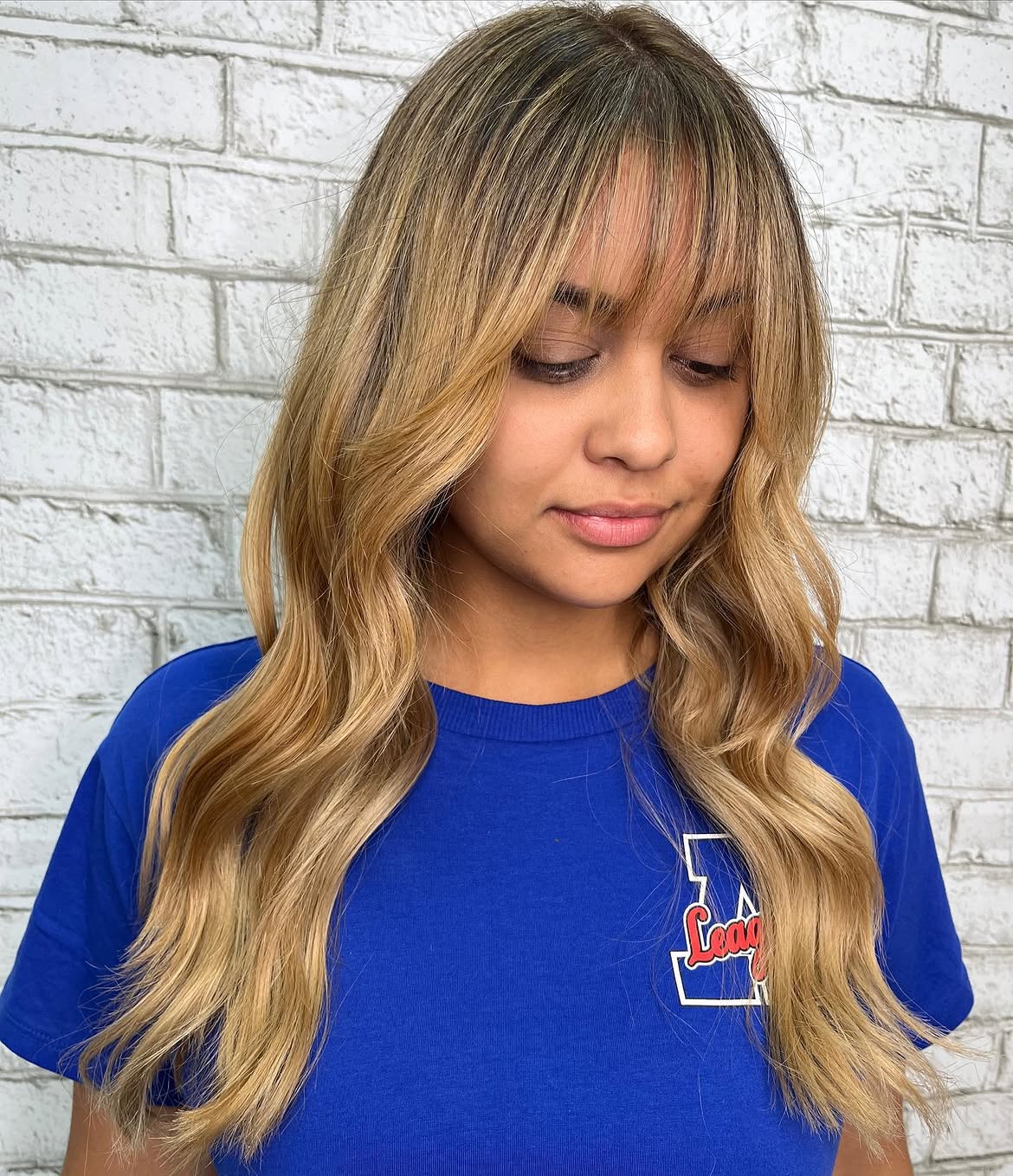 Soft Honey Blonde Balayage With Wispy Bangs