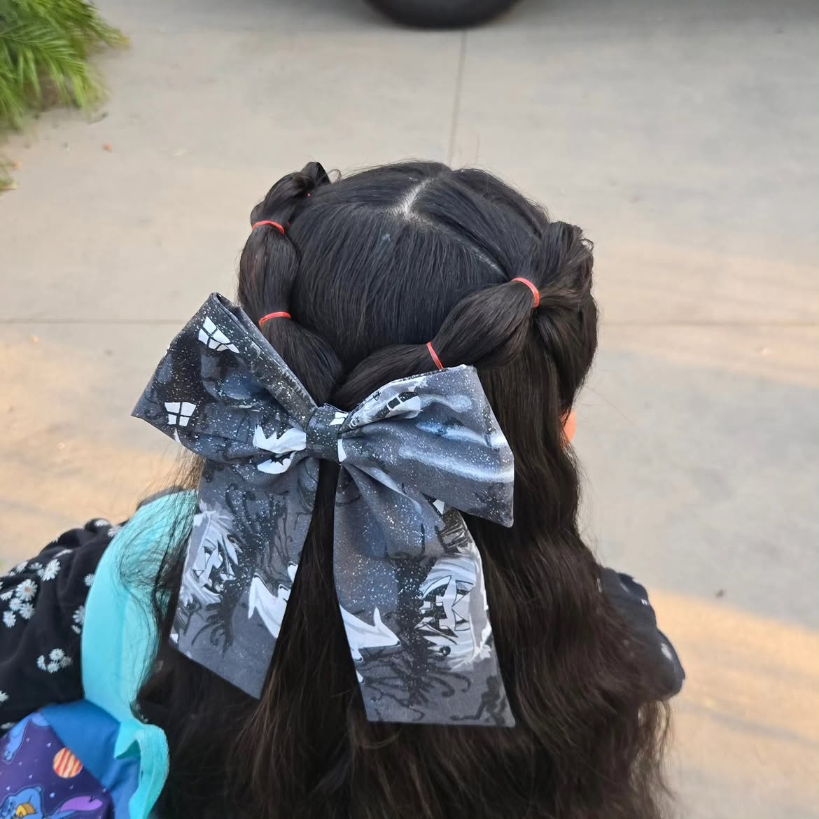 Spooky Braided Pigtails With Halloween Bow