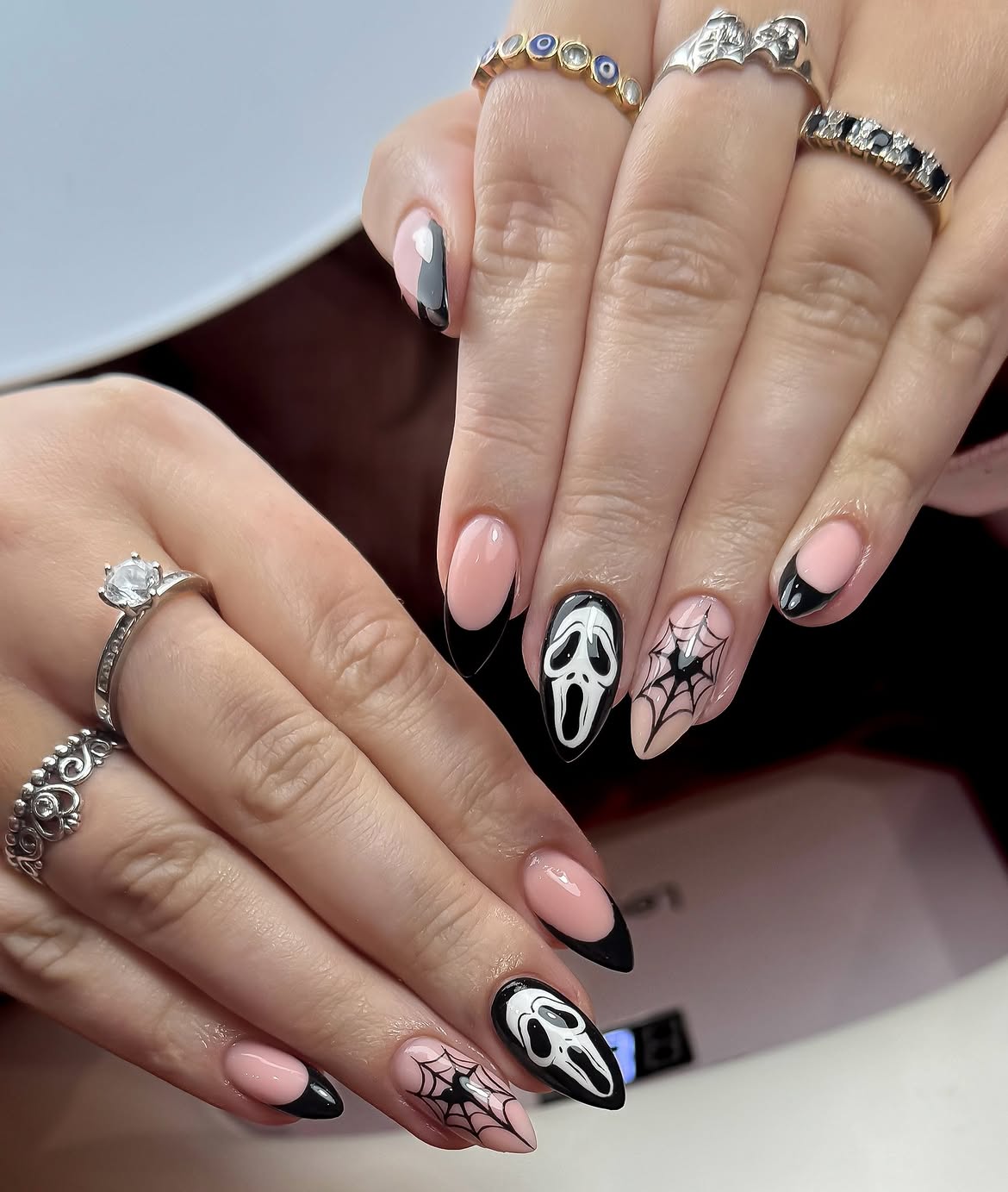 Spooky Ghost Face French Tip Almond Nails