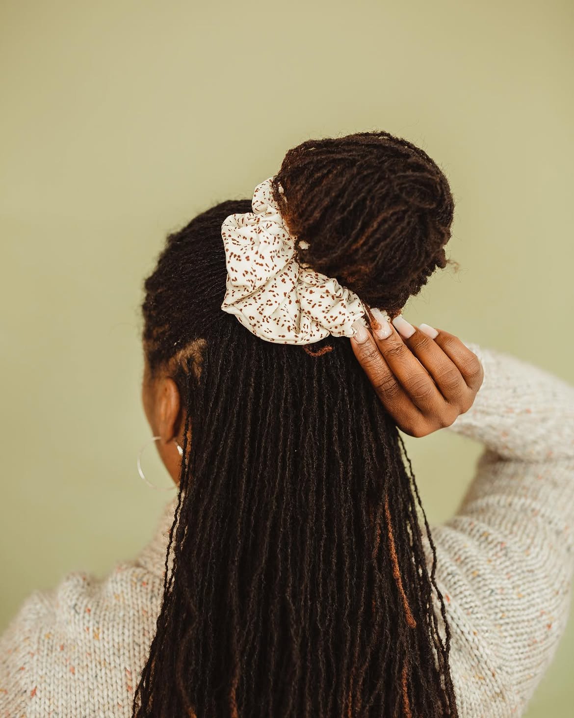 Textured High Bun With Floral Scrunchie Accessory