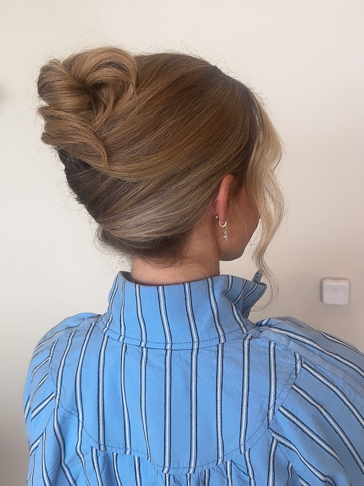 Twisted Low Bun With Face-Framing Pieces