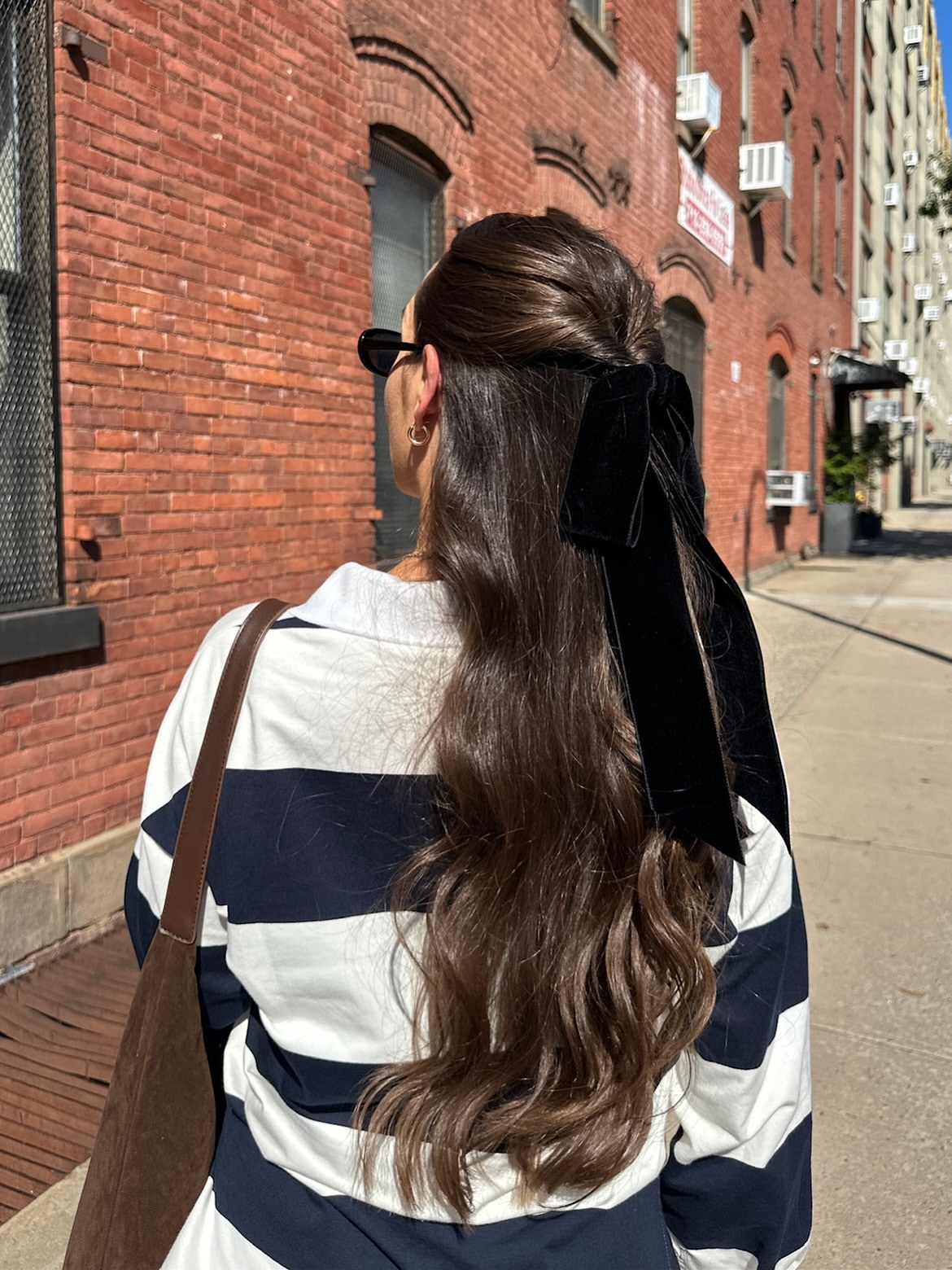 Velvet Bow Half-Up Waves For Long Brunette Hair