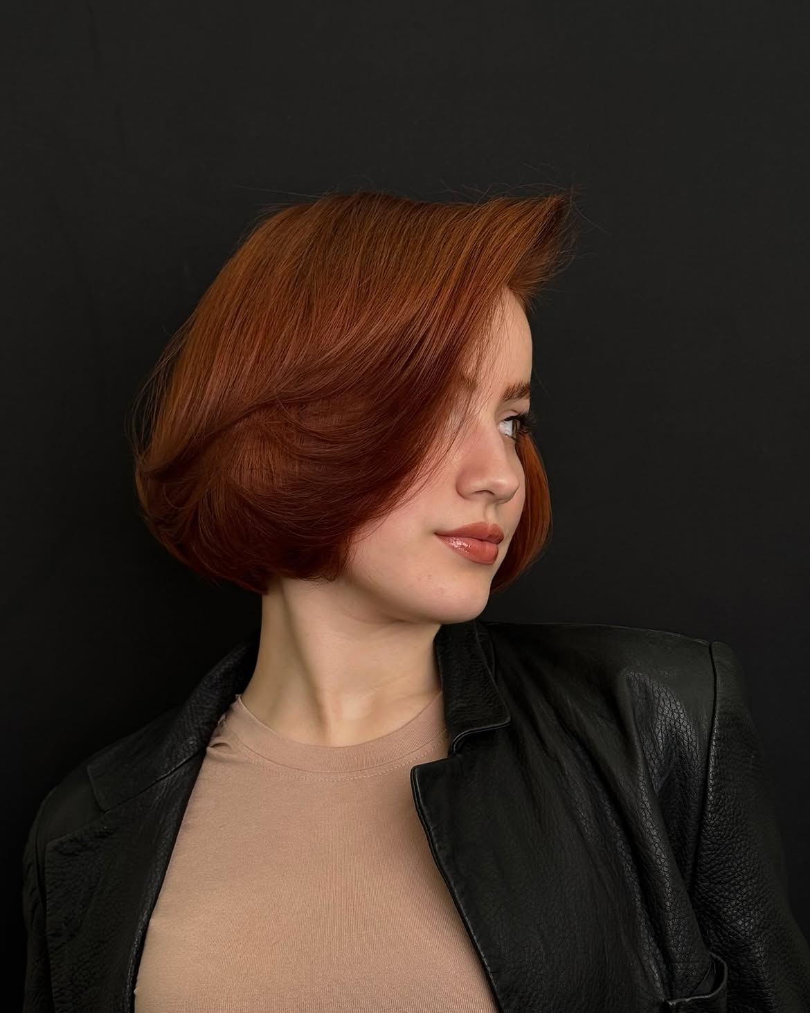 Vibrant Auburn Bob With Voluminous Waves
