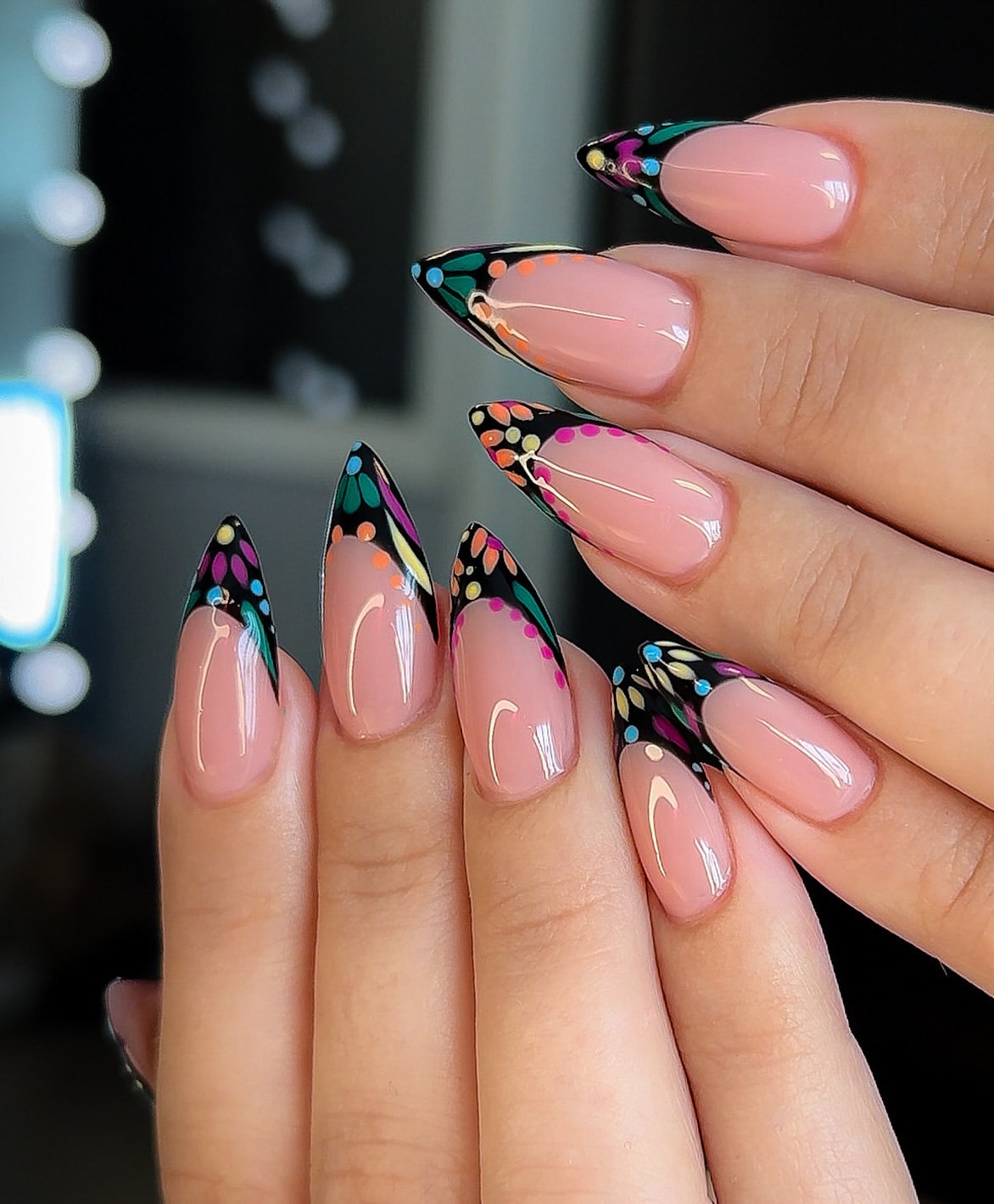 Vibrant Butterfly Wing French Tip Almond Nails