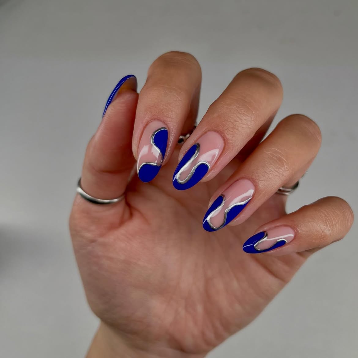 Vibrant Cobalt Swirl Almond Nails