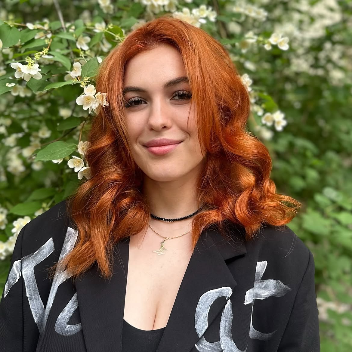 Vibrant Copper Waves With Face Framing Layers