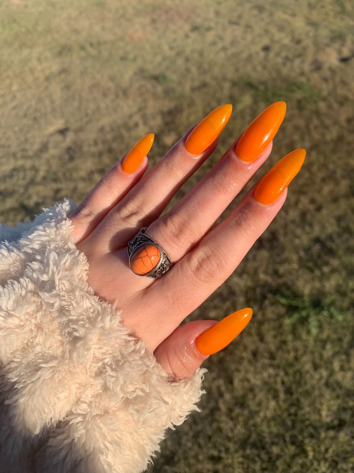 Vibrant Neon Orange Stiletto Gel Nails