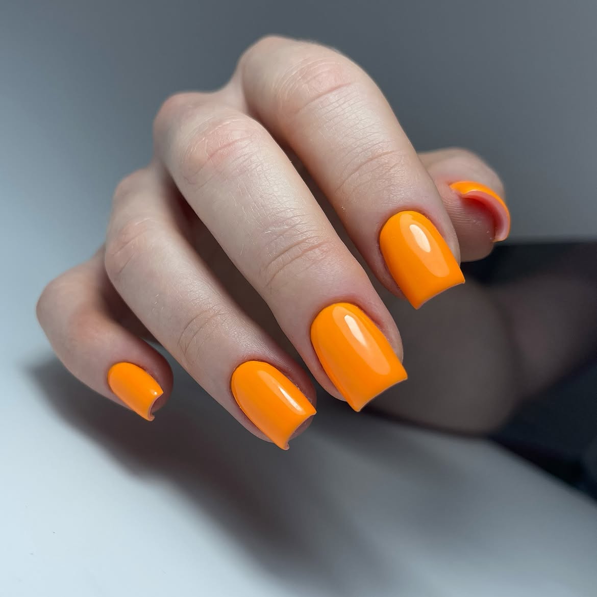 Vibrant Orange Glossy Square Nails