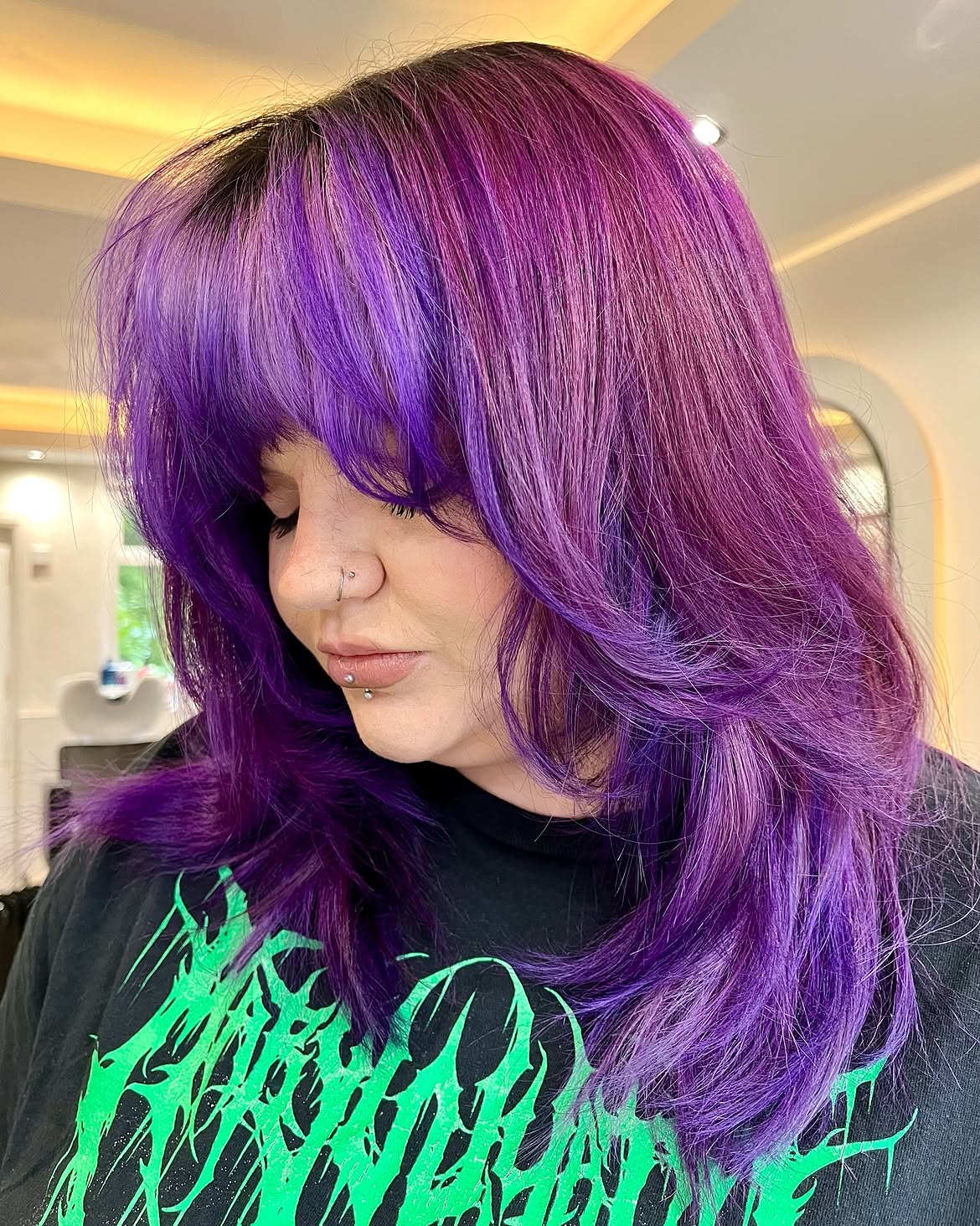 Vibrant Purple Shag With Wispy Bangs