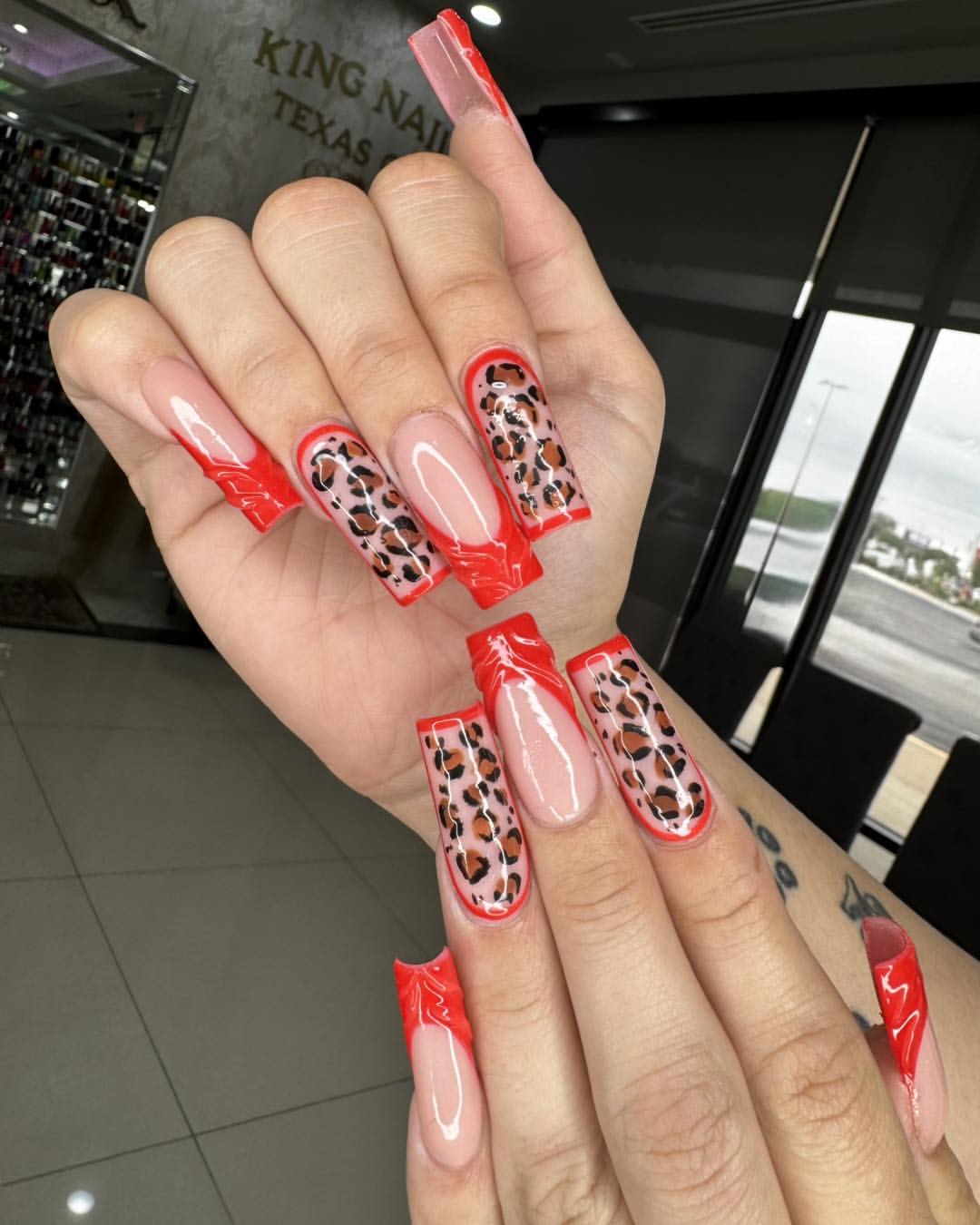 Vibrant Red Leopard Print French Tips