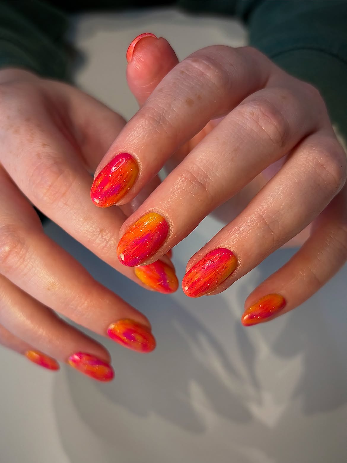 Vibrant Sunset Orange Pink Swirl Nails