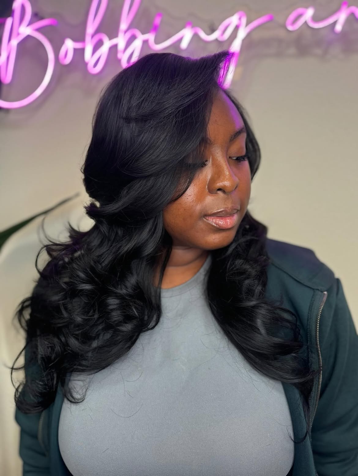 Voluminous Silk Press With Soft Face-Framing Layers