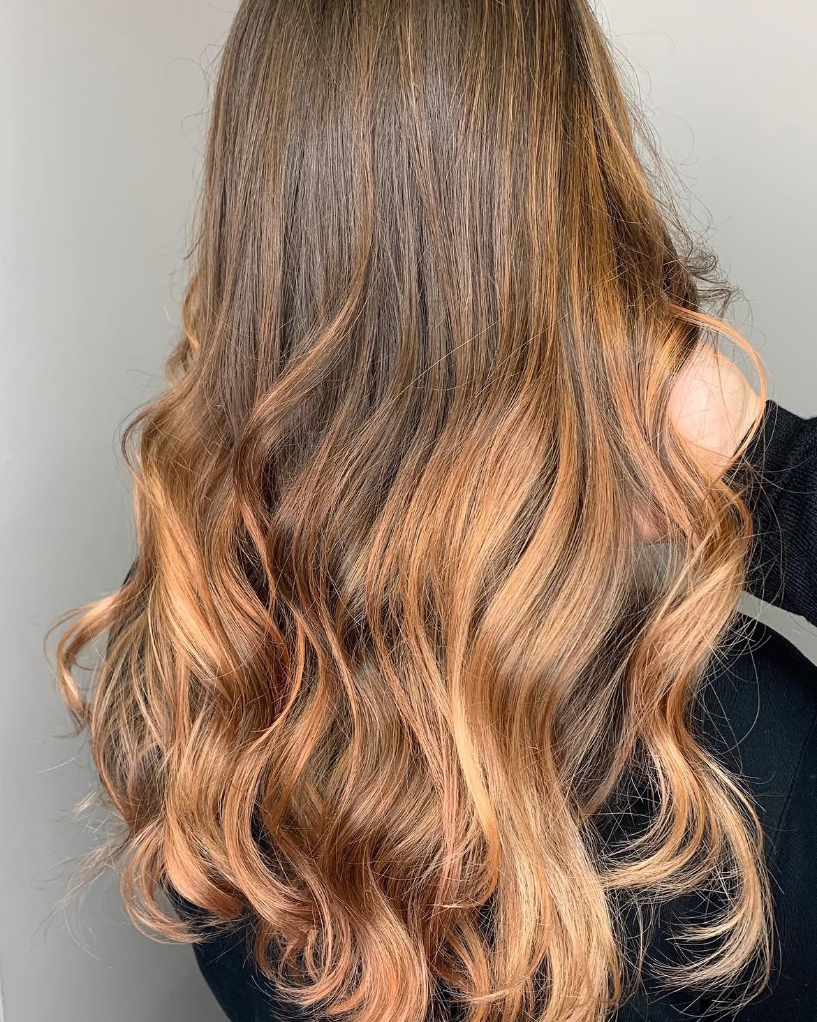 Warm Bronde Waves With Copper Balayage