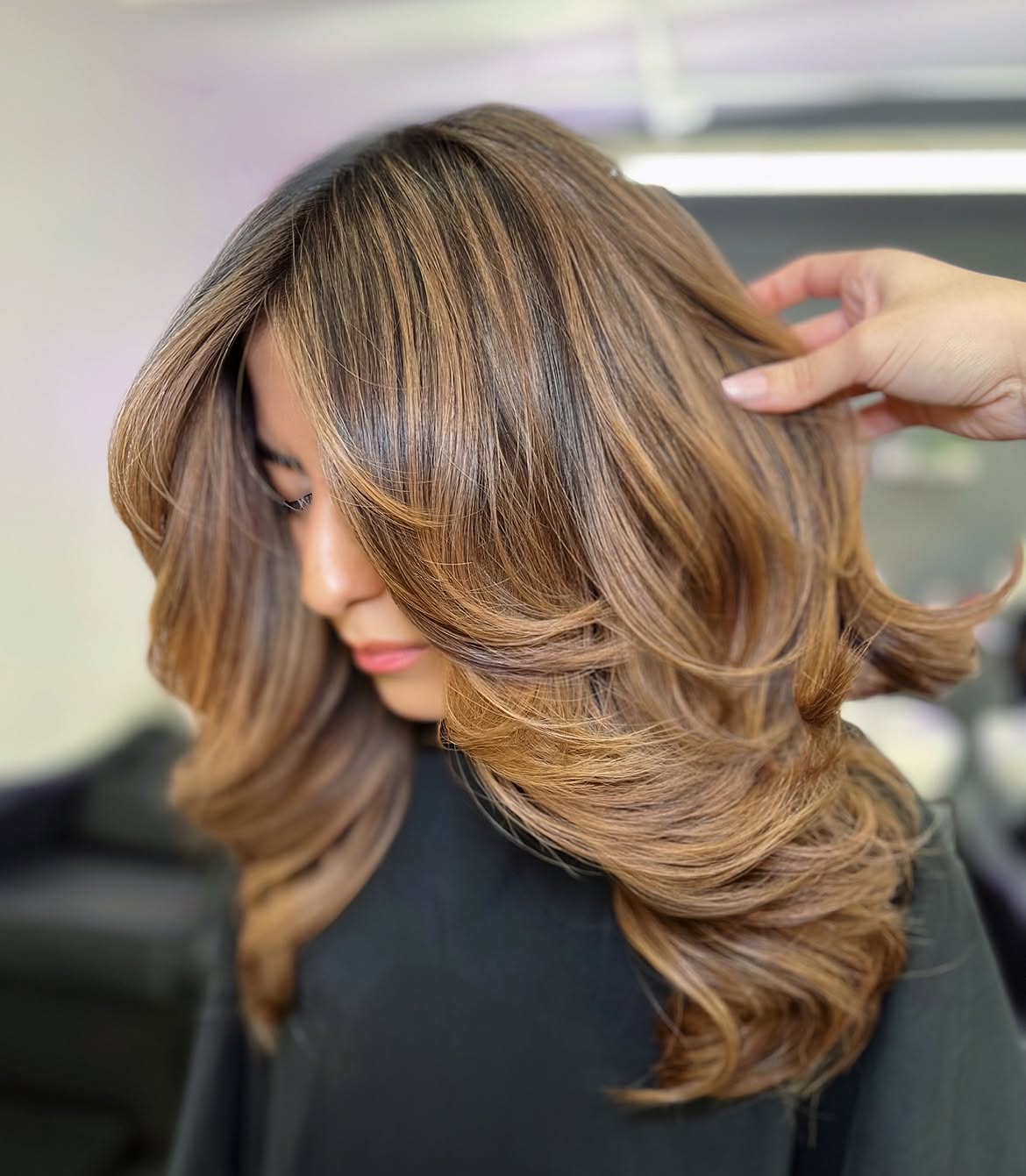 Warm Caramel Balayage With Layered Waves