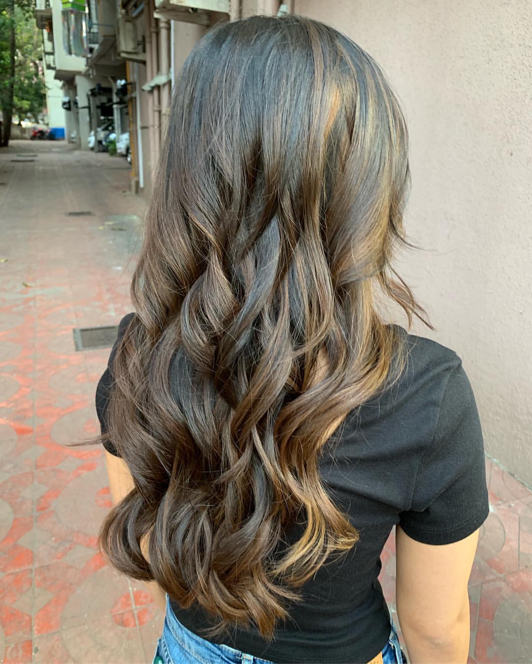 Warm Chestnut Balayage Waves With Face Framing