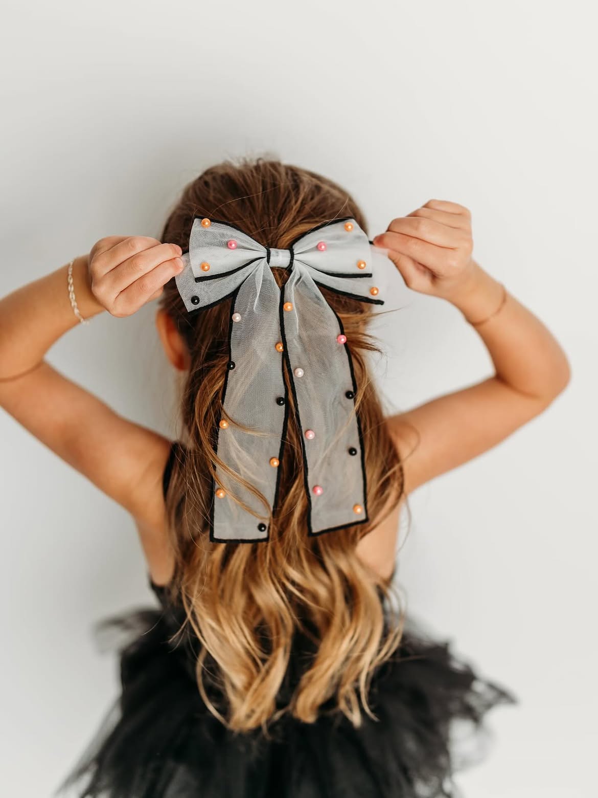 Whimsical Pearl-Beaded Bow Halloween Hairstyle