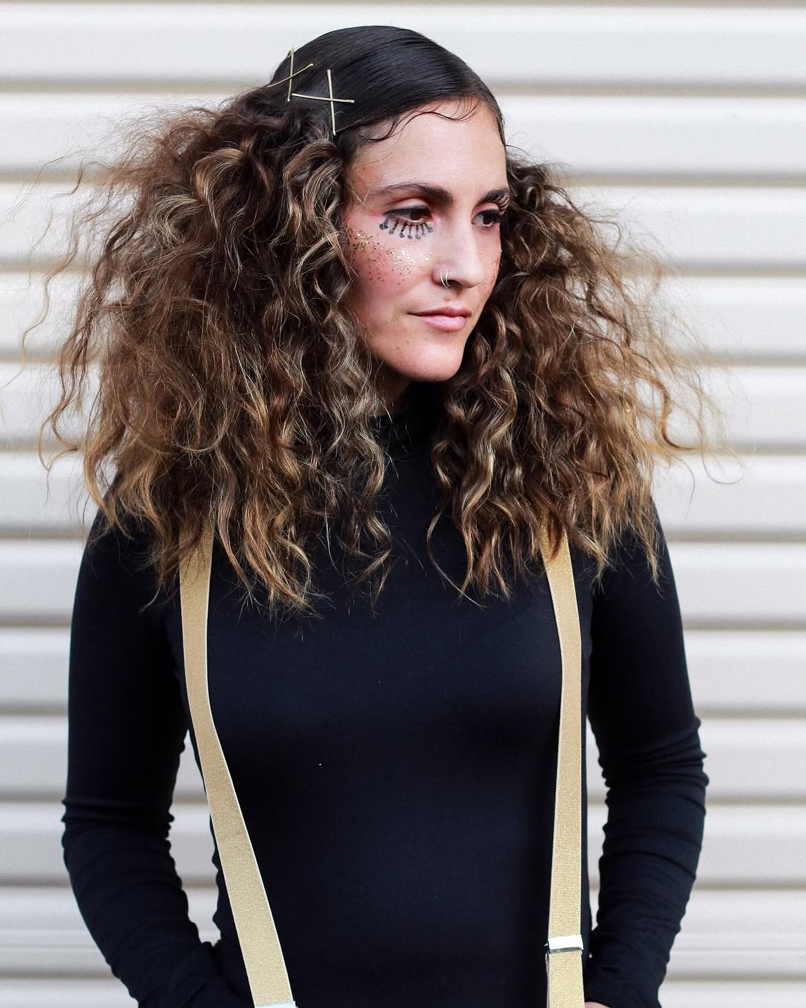 Wild, Voluminous Curls With Metallic Hair Pins