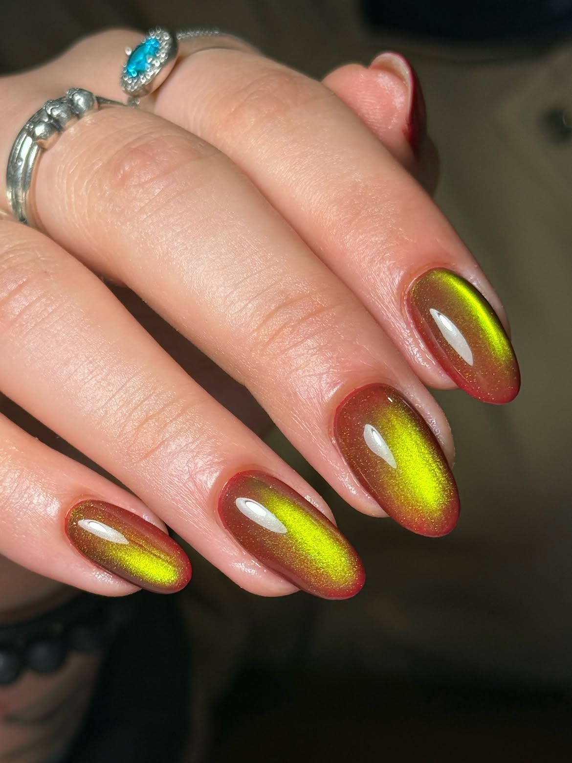 Amber Green Cat Eye Almond Nails