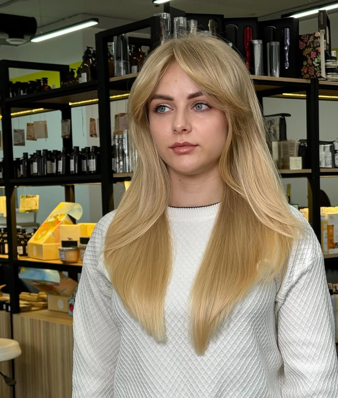 Blonde Butterfly Cut With Face Framing Layers