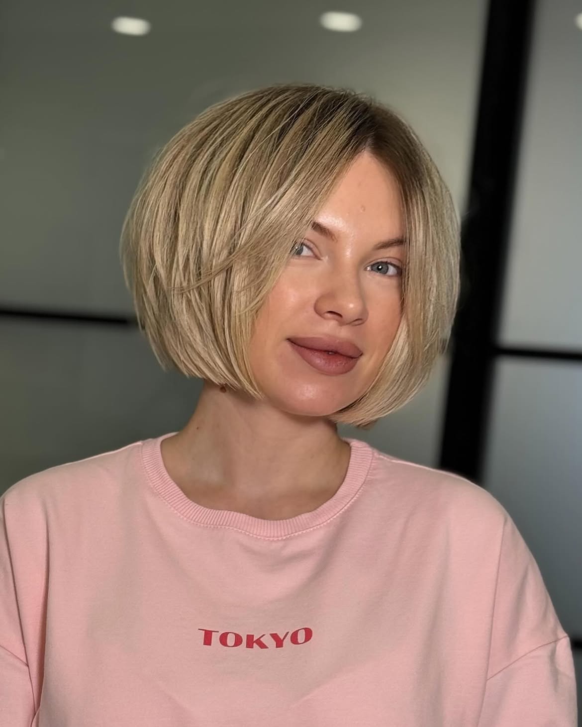 Blonde Layered Bob With Soft Face Framing Bangs