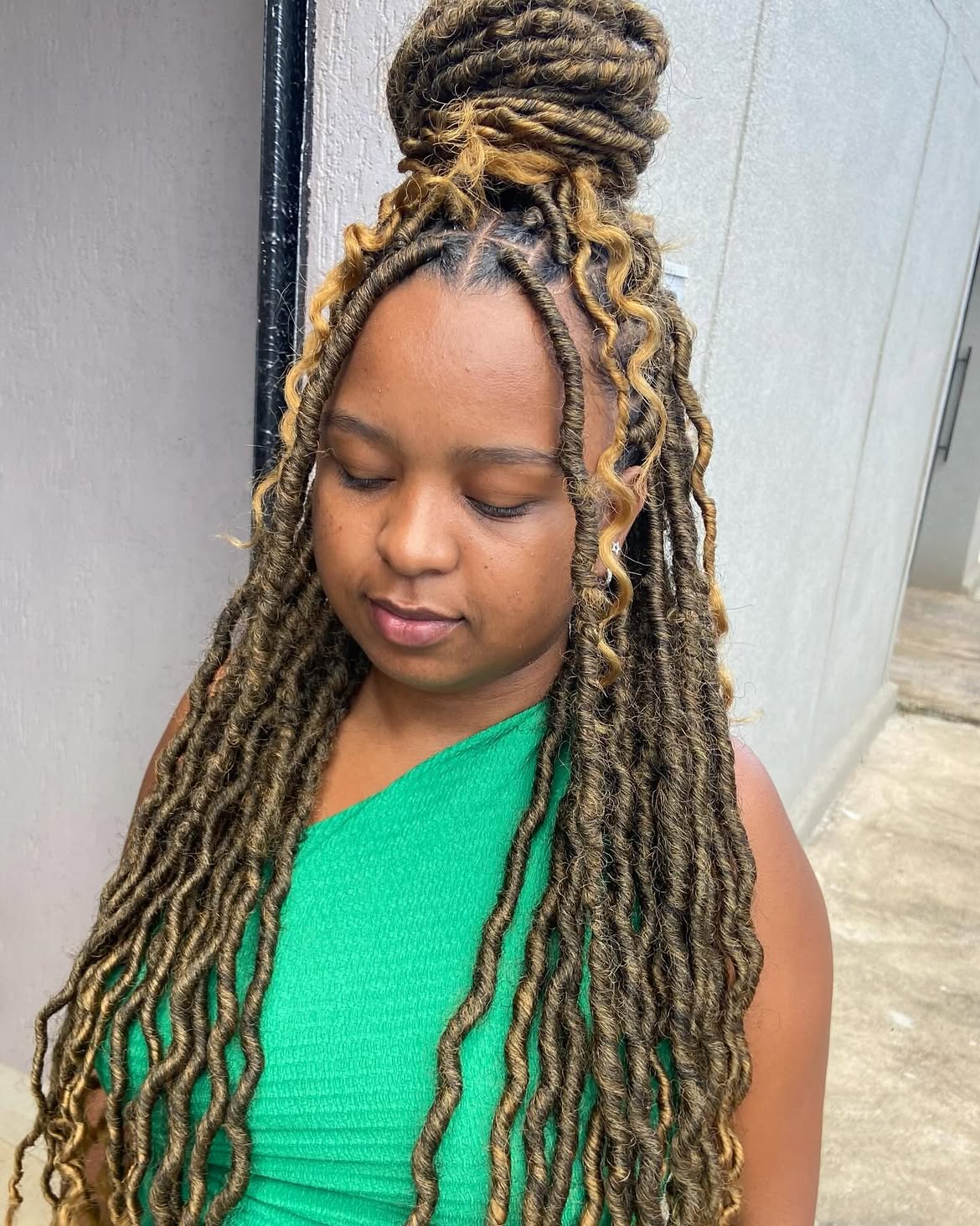 Bohemian Blonde Streaked Faux Locs Bun